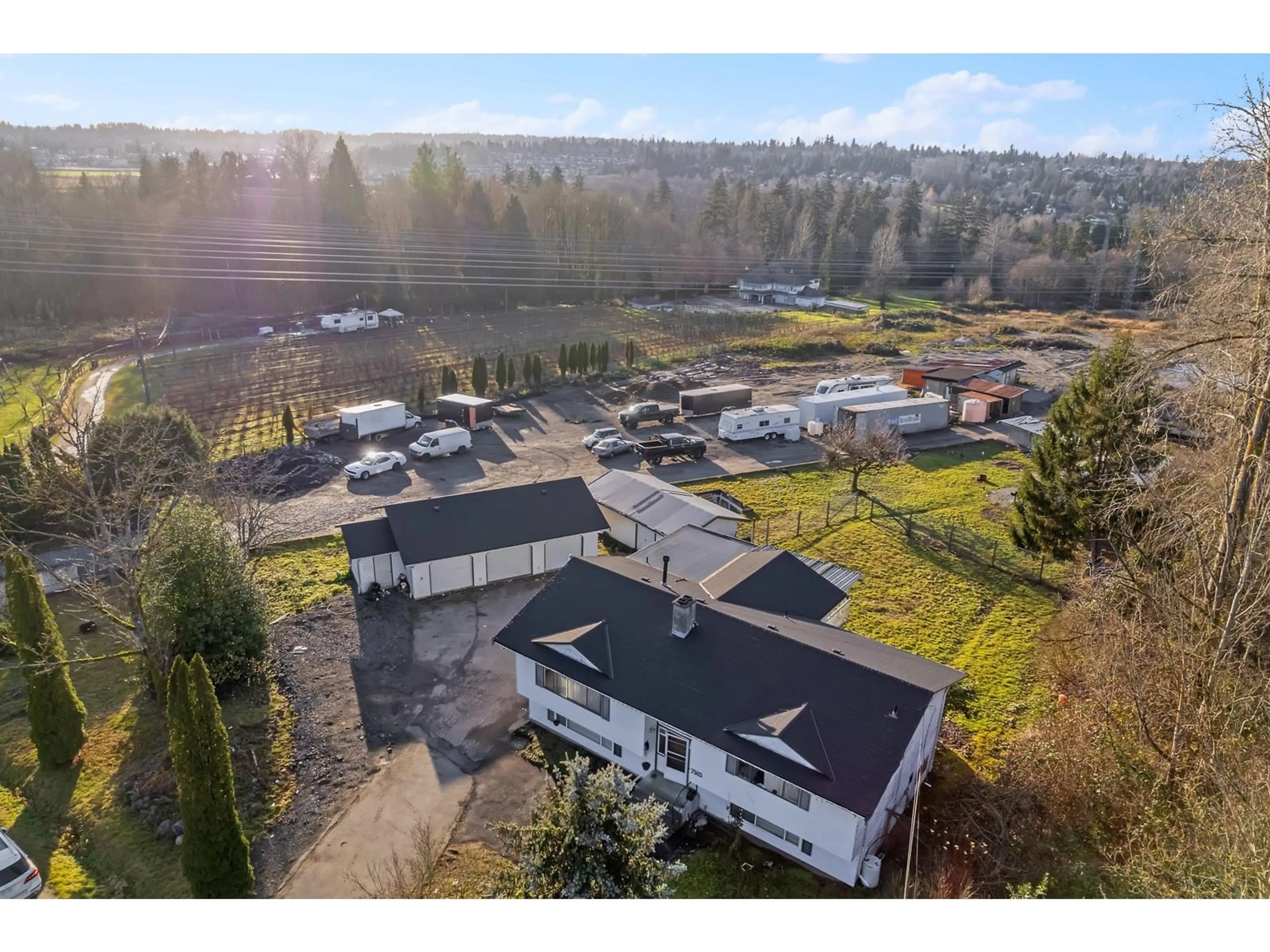 A pic from outside/outdoor area/front of a property/back of a property/a pic from drone, mountain view for 7585 156, Surrey British Columbia V3S3R1