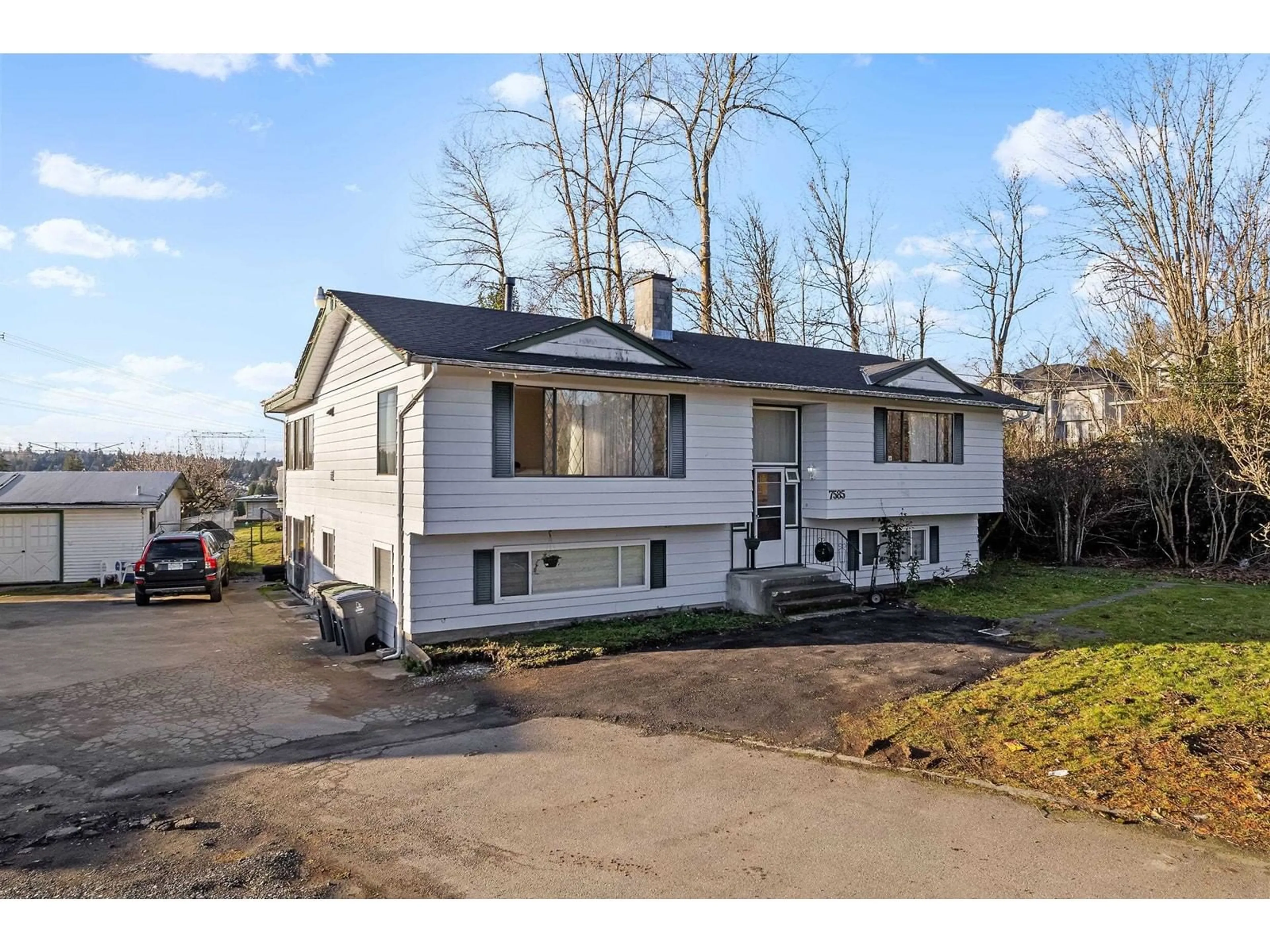 A pic from outside/outdoor area/front of a property/back of a property/a pic from drone, street for 7585 156, Surrey British Columbia V3S3R1