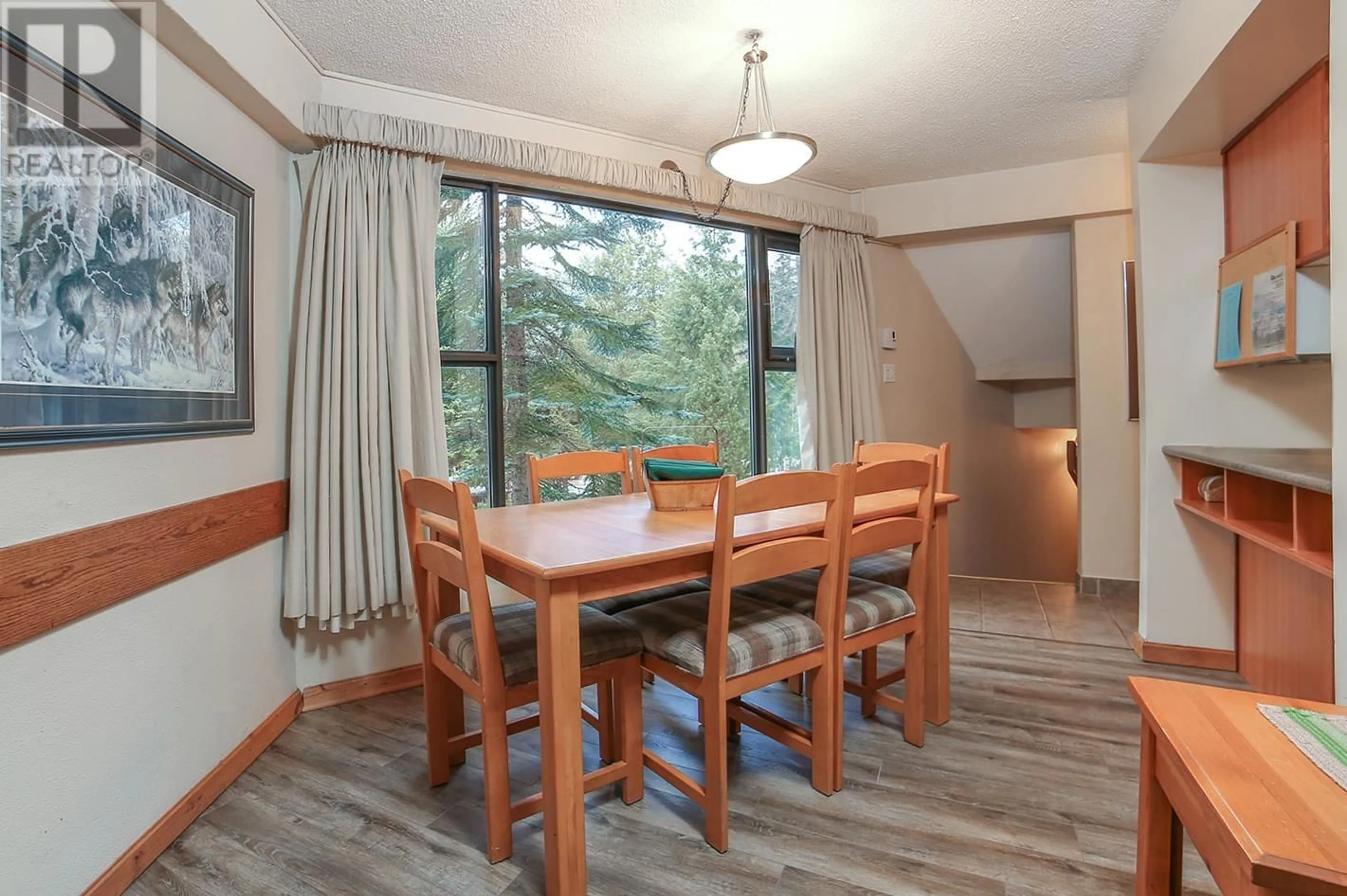 Dining room, wood/laminate floor for 6B 2561 TRICOUNI PLACE, Whistler British Columbia V8E0A8