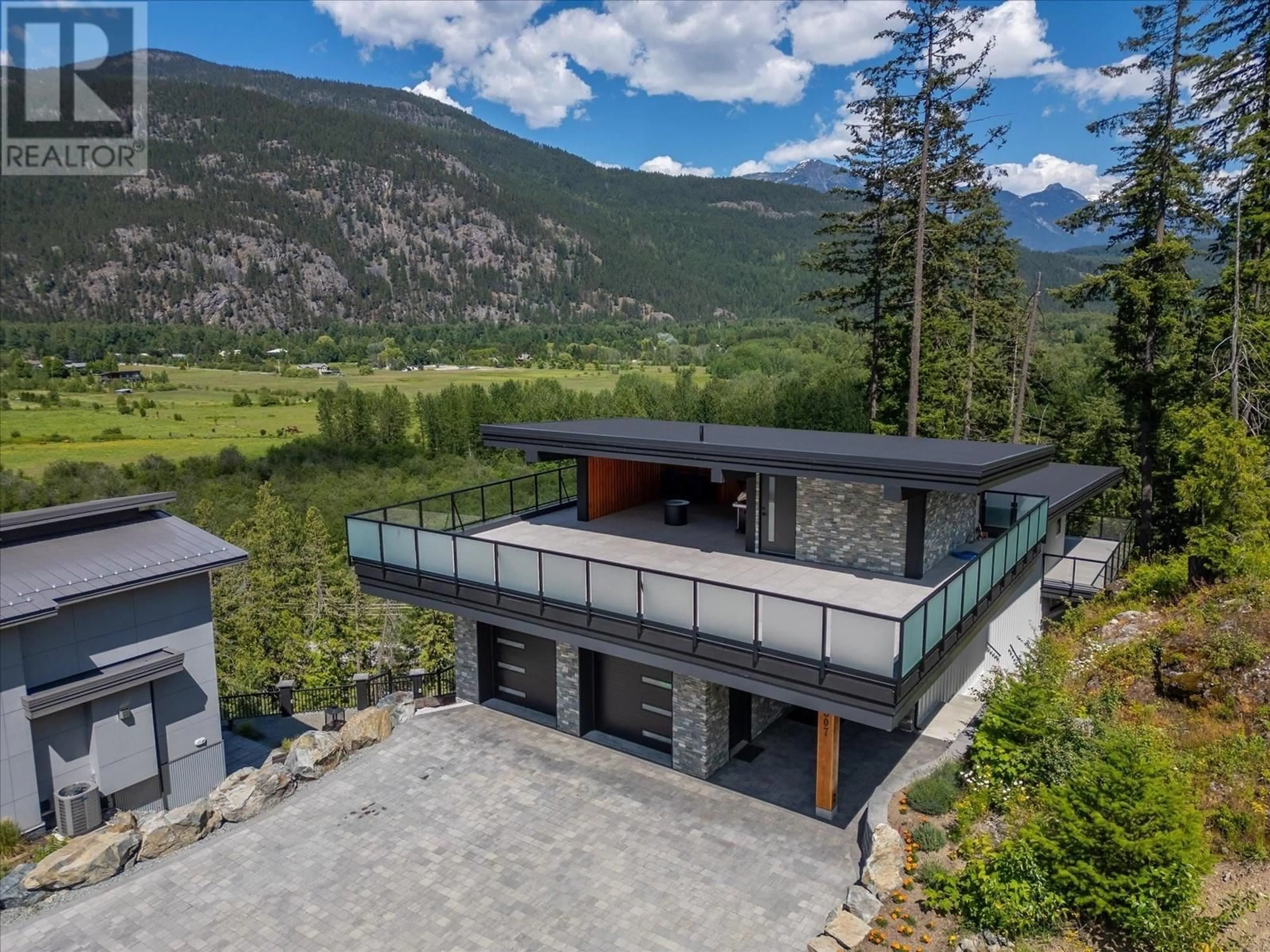 A pic from outside/outdoor area/front of a property/back of a property/a pic from drone, mountain view for 1307 EAGLE DRIVE, Pemberton British Columbia V0N2L0