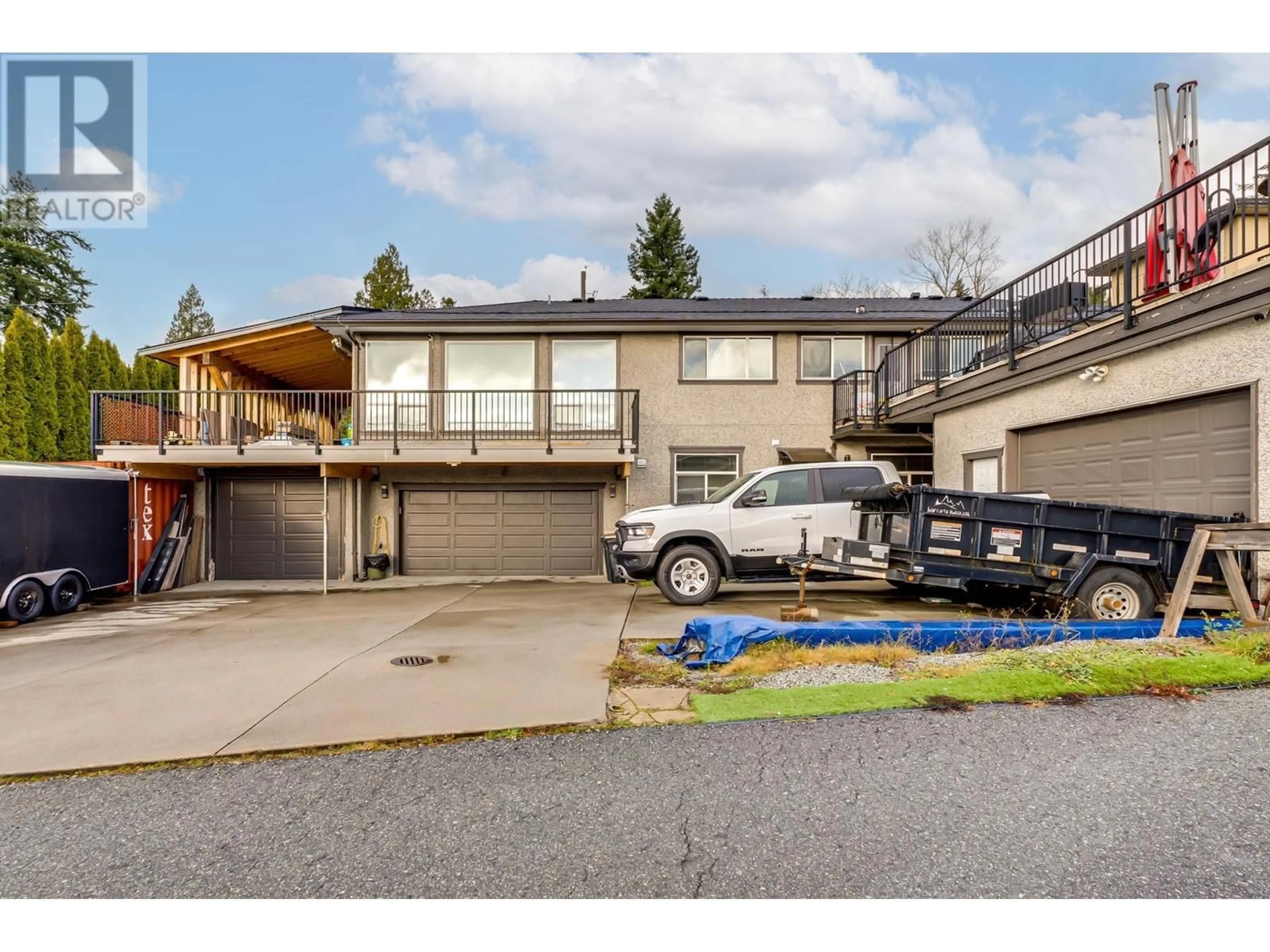 A pic from outside/outdoor area/front of a property/back of a property/a pic from drone, street for 7312 BROADWAY, Burnaby British Columbia V5A1S2