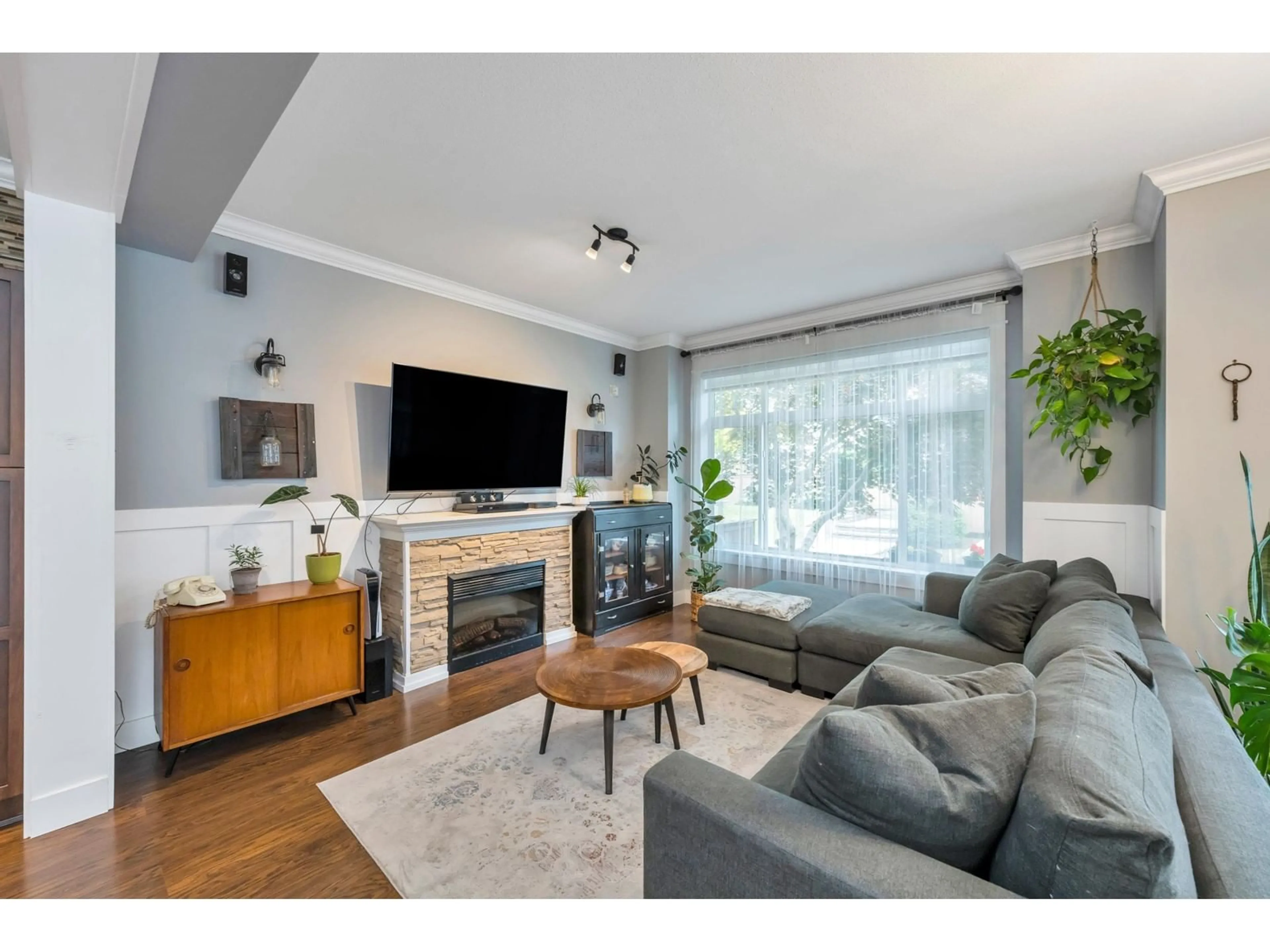 Living room with furniture, wood/laminate floor for 45 6036 164 STREET, Surrey British Columbia V3S3V8