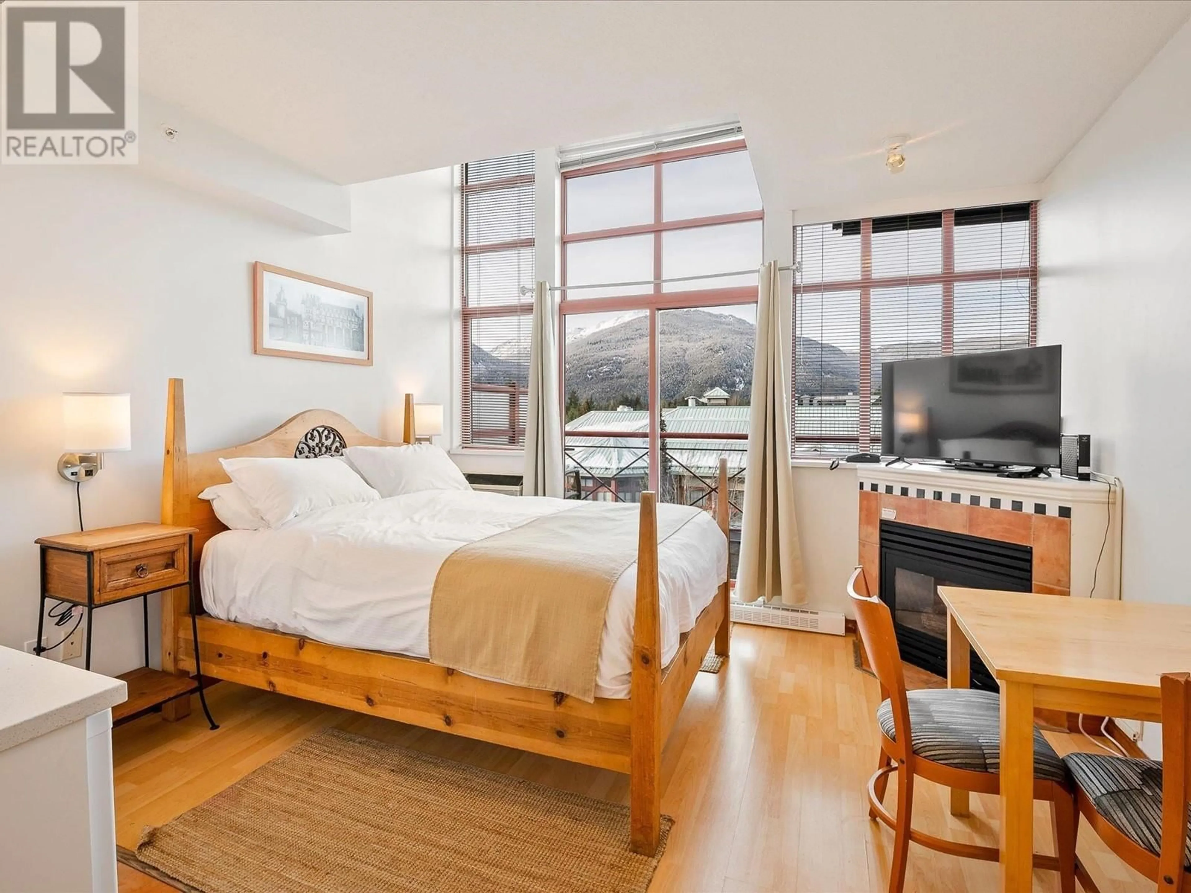 Bedroom with bed, wood/laminate floor for 510 - 4369 MAIN STREET, Whistler British Columbia V8E1B7
