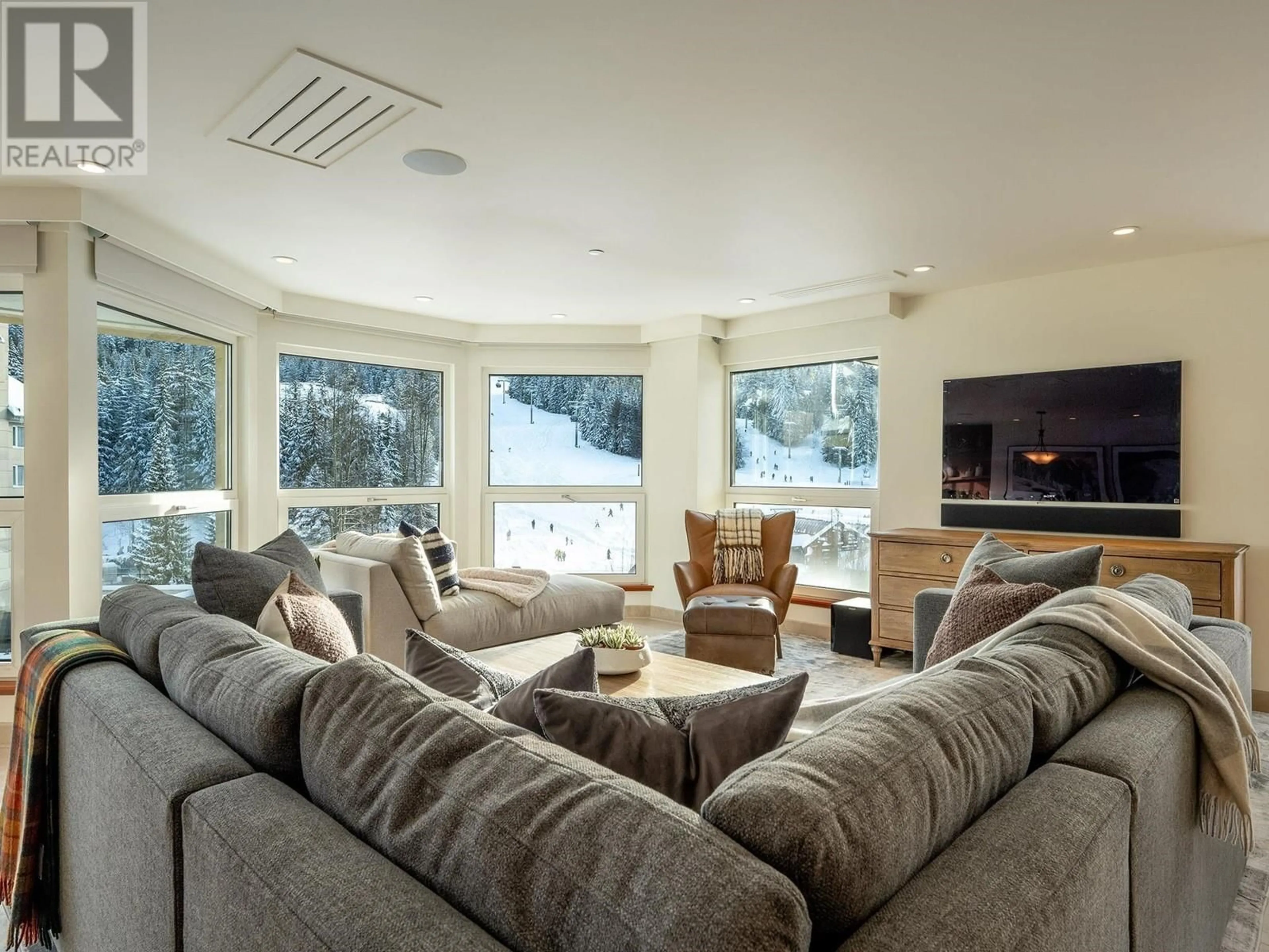 Living room with furniture, unknown for 501.601 4557 BLACKCOMB WAY, Whistler British Columbia V8E0Y2