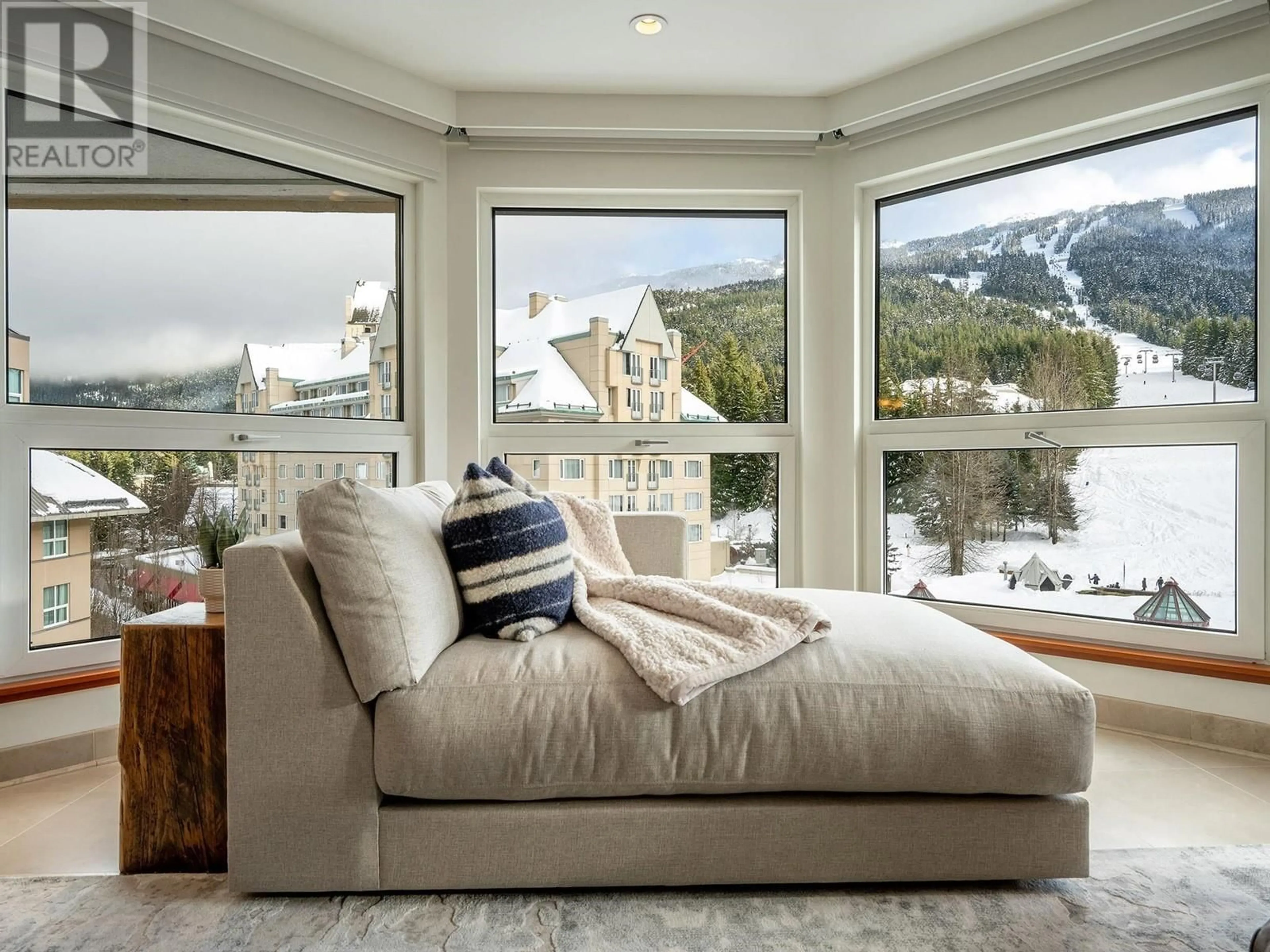 Living room with furniture, unknown for 501.601 4557 BLACKCOMB WAY, Whistler British Columbia V8E0Y2