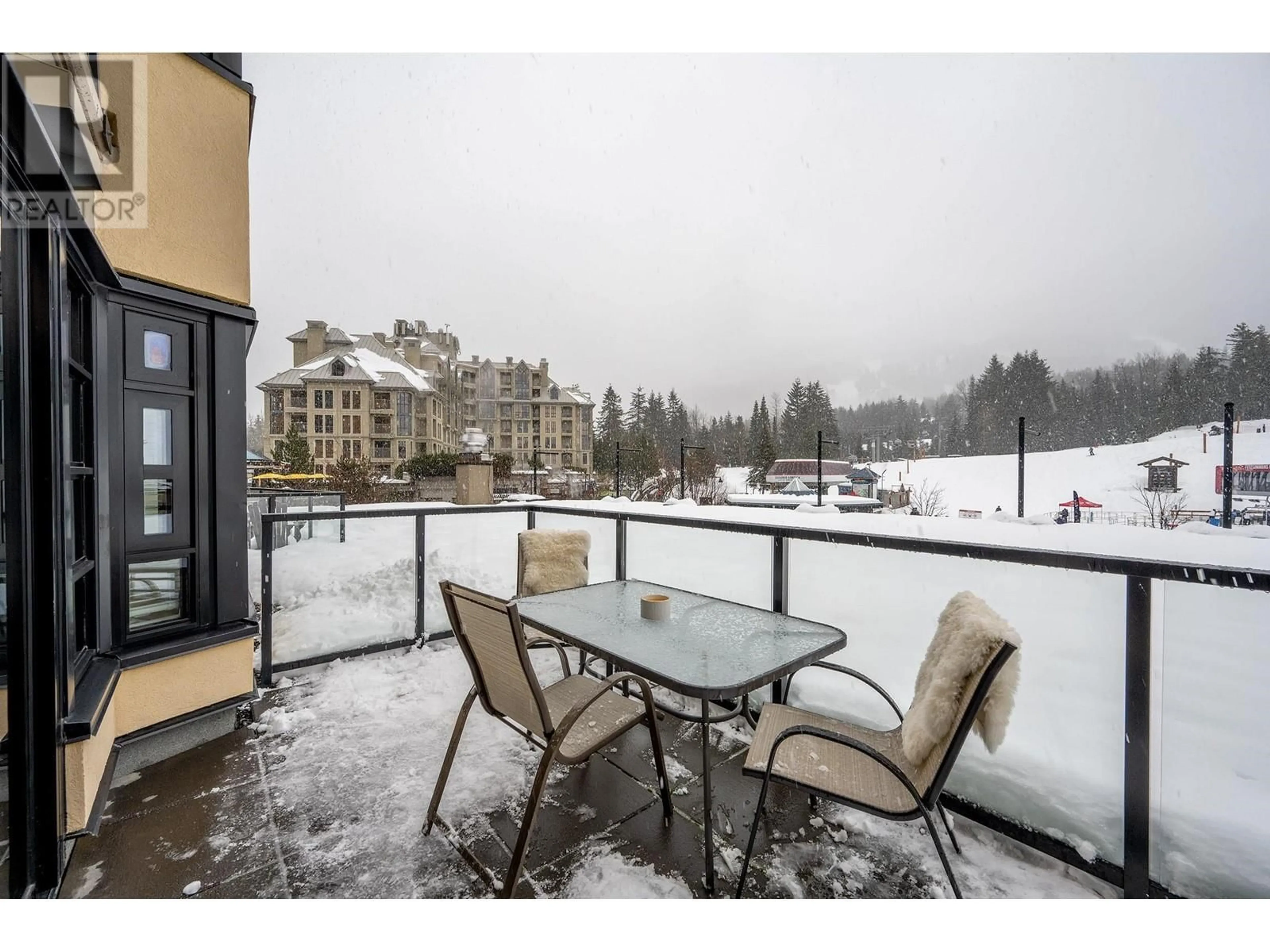 Patio, water/lake/river/ocean view for 202 4280 MOUNTAIN SQUARE, Whistler British Columbia V8E1B9