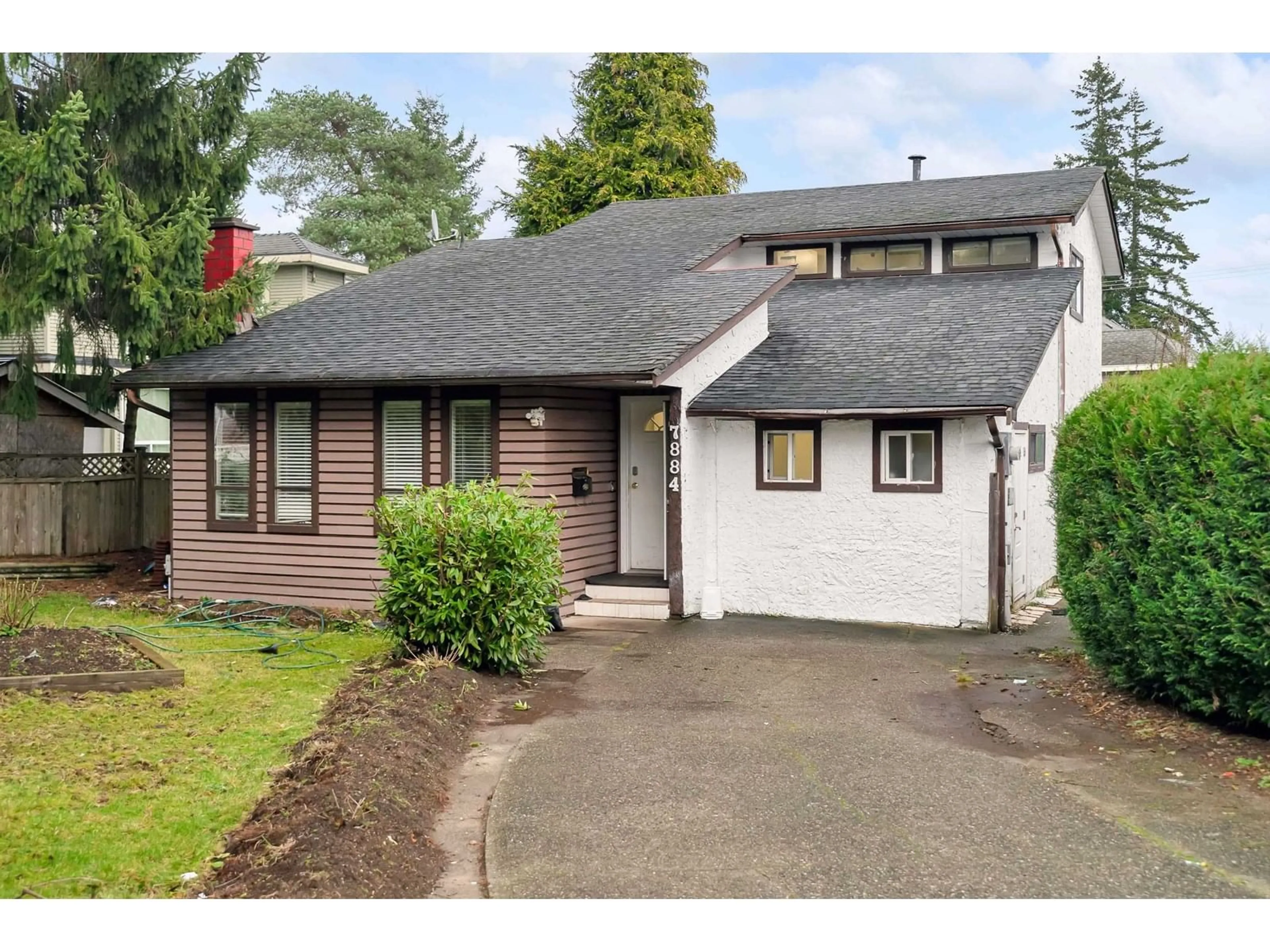 Home with vinyl exterior material, street for 7884 126A, Surrey British Columbia V3W7M2