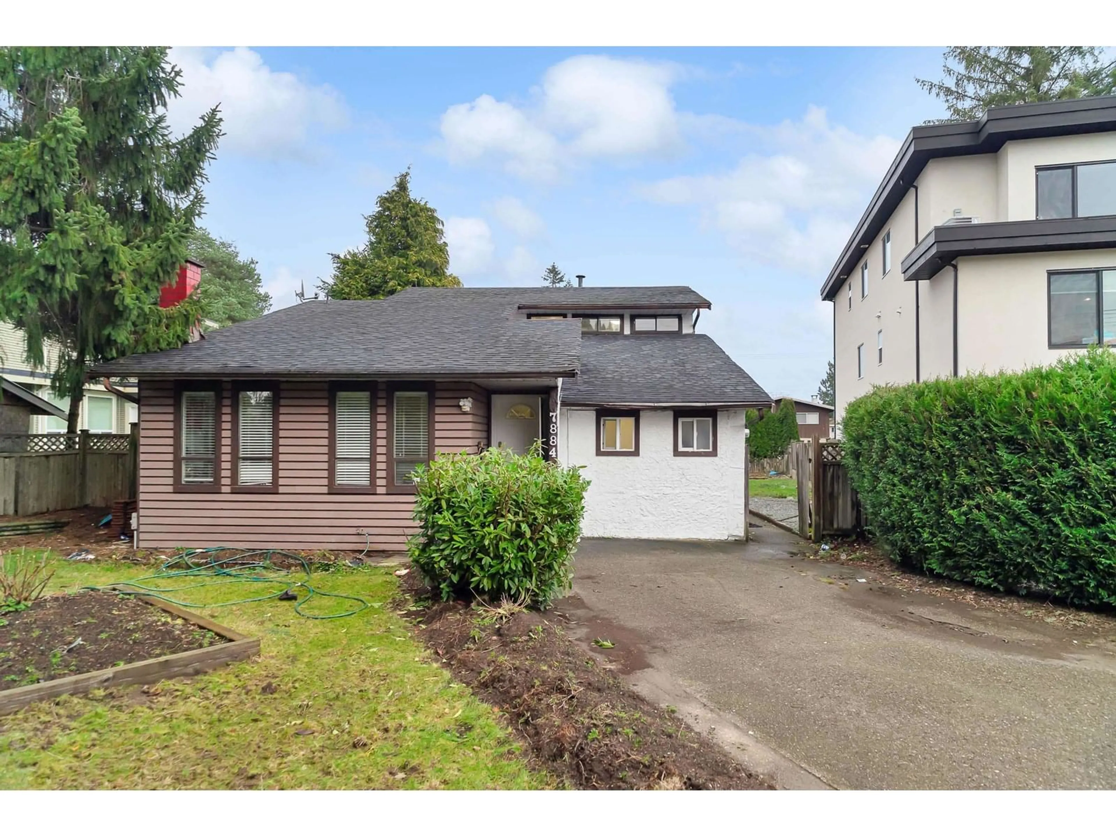 Home with vinyl exterior material, street for 7884 126A, Surrey British Columbia V3W7M2