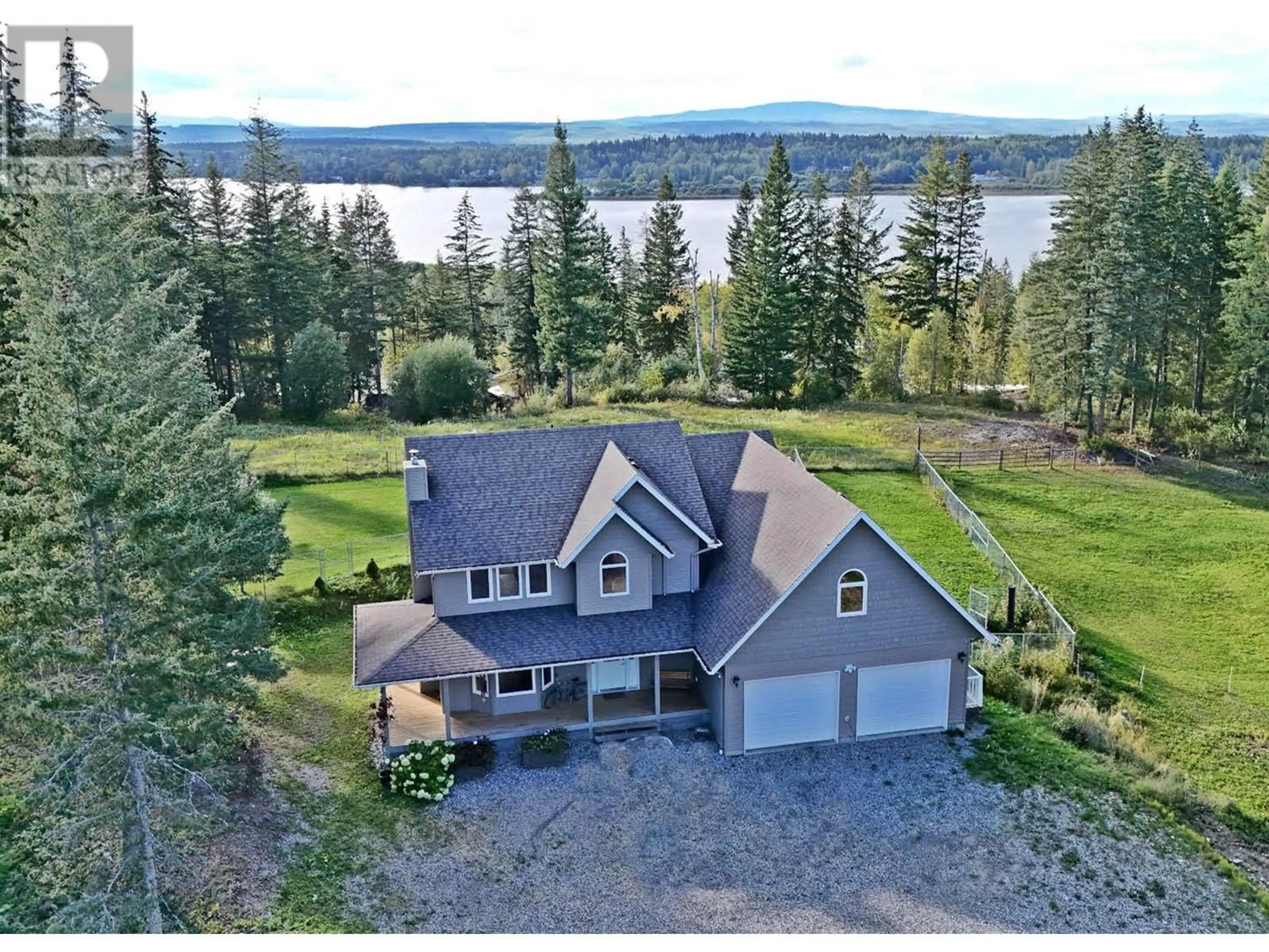 A pic from outside/outdoor area/front of a property/back of a property/a pic from drone, water/lake/river/ocean view for 1551 VIEW DRIVE, Quesnel British Columbia V2J6G1