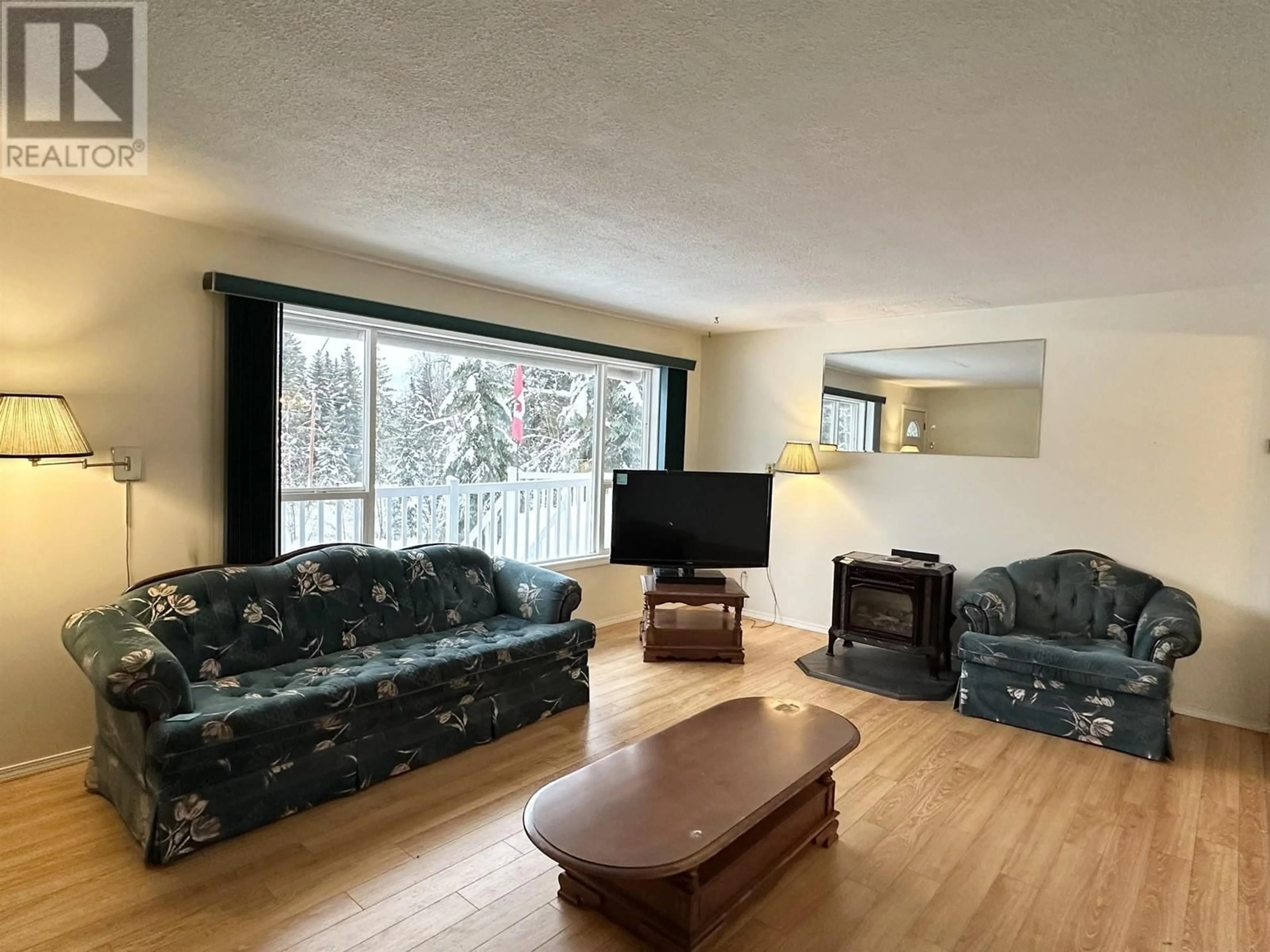 Living room with furniture, wood/laminate floor for 5427 FERGUSON LAKE ROAD, Prince George British Columbia V2K5V2