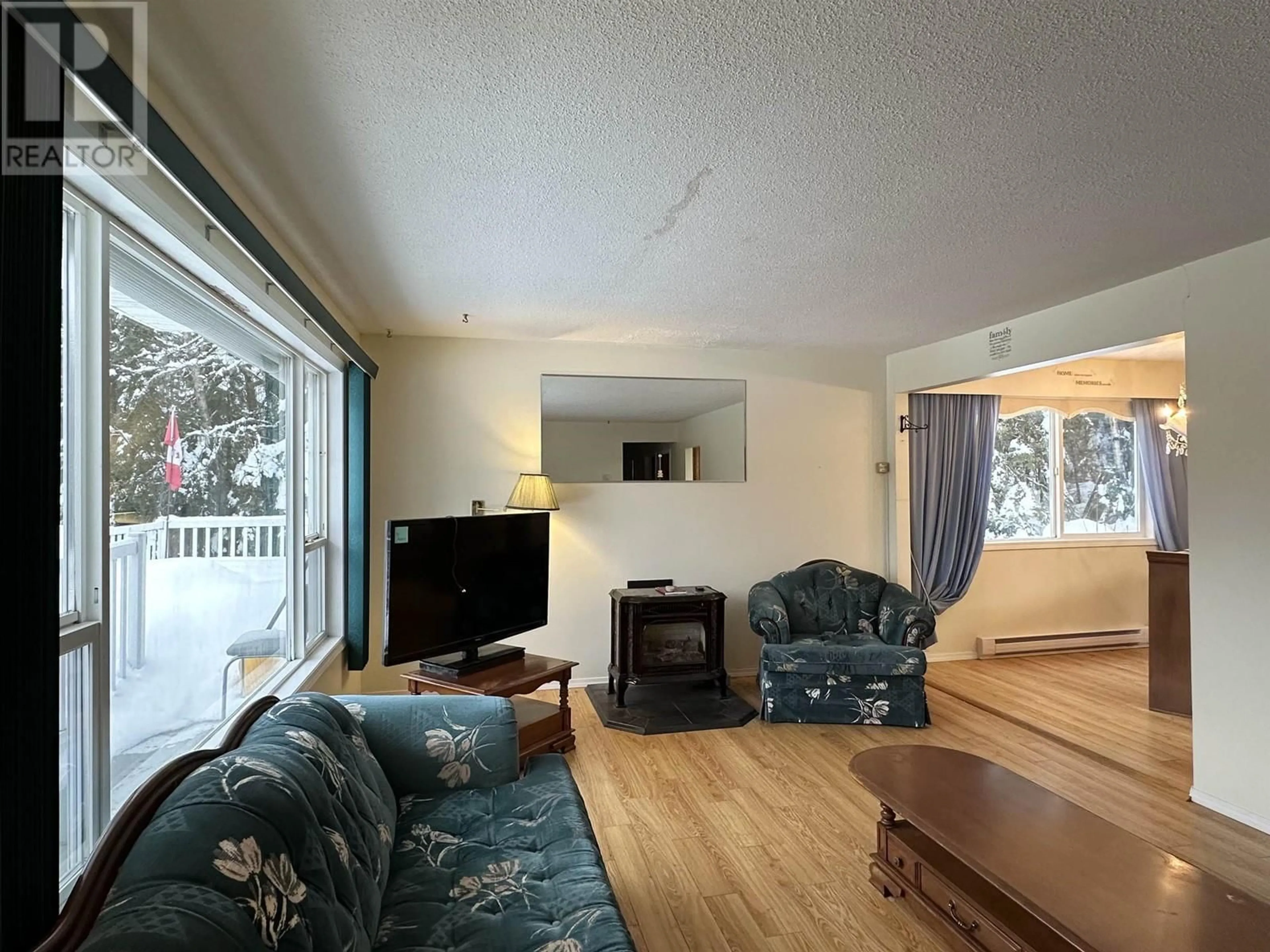 Living room with furniture, wood/laminate floor for 5427 FERGUSON LAKE ROAD, Prince George British Columbia V2K5V2