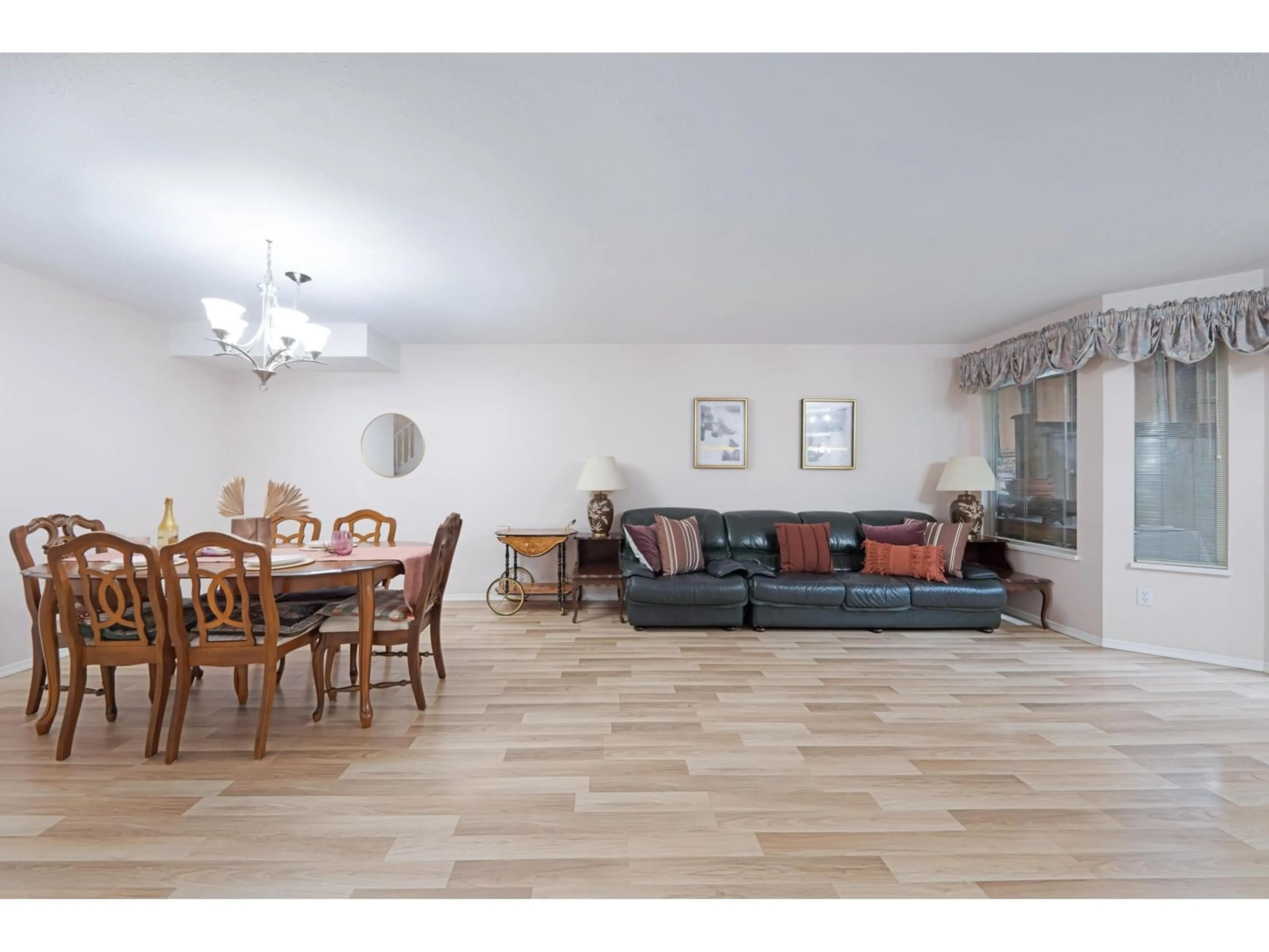 Living room with furniture, wood/laminate floor for 416 6866 NICHOLSON ROAD, Delta British Columbia V4E3M6