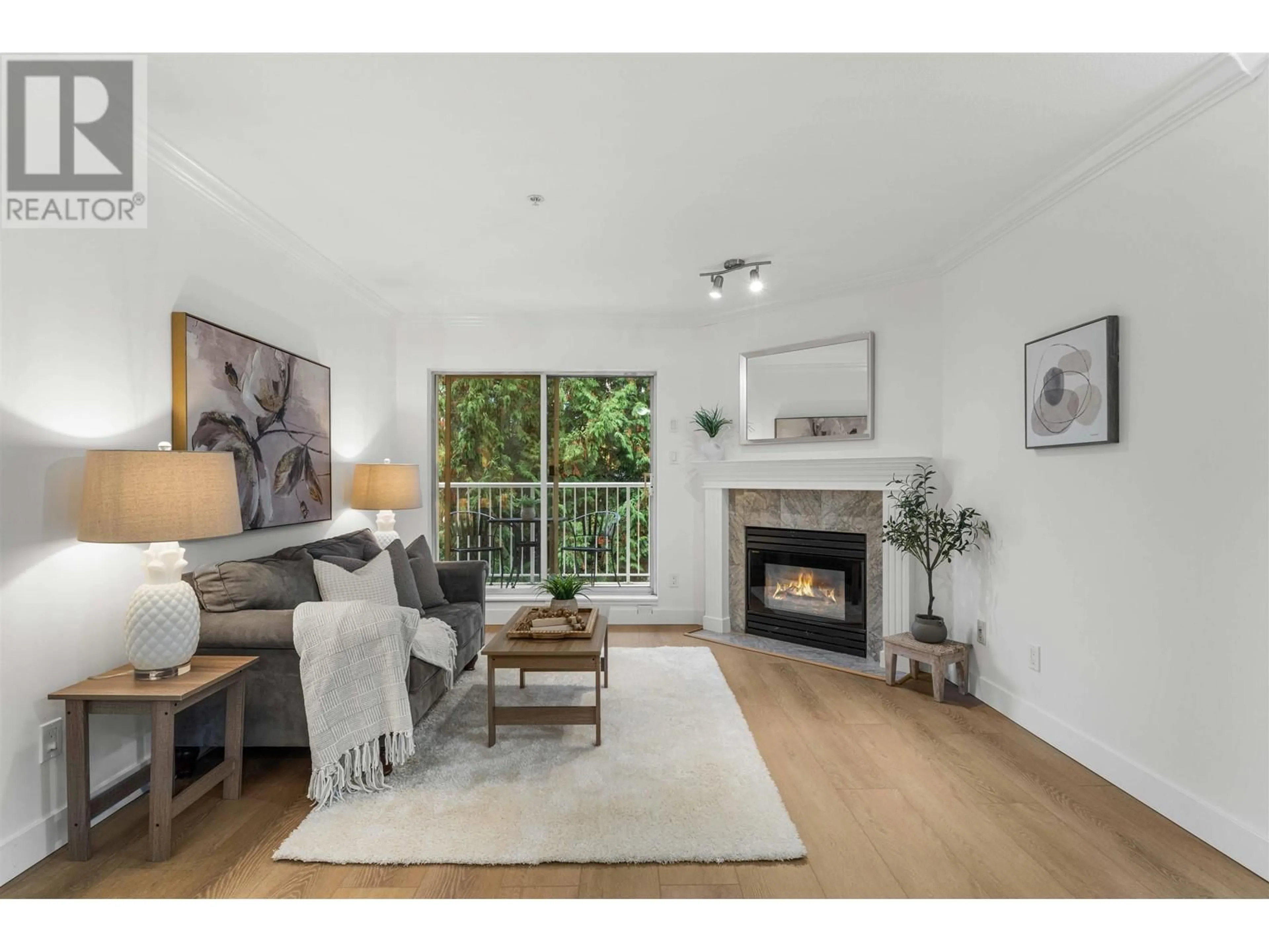 Living room with furniture, wood/laminate floor for 406 12206 224 STREET, Maple Ridge British Columbia V2X6B8