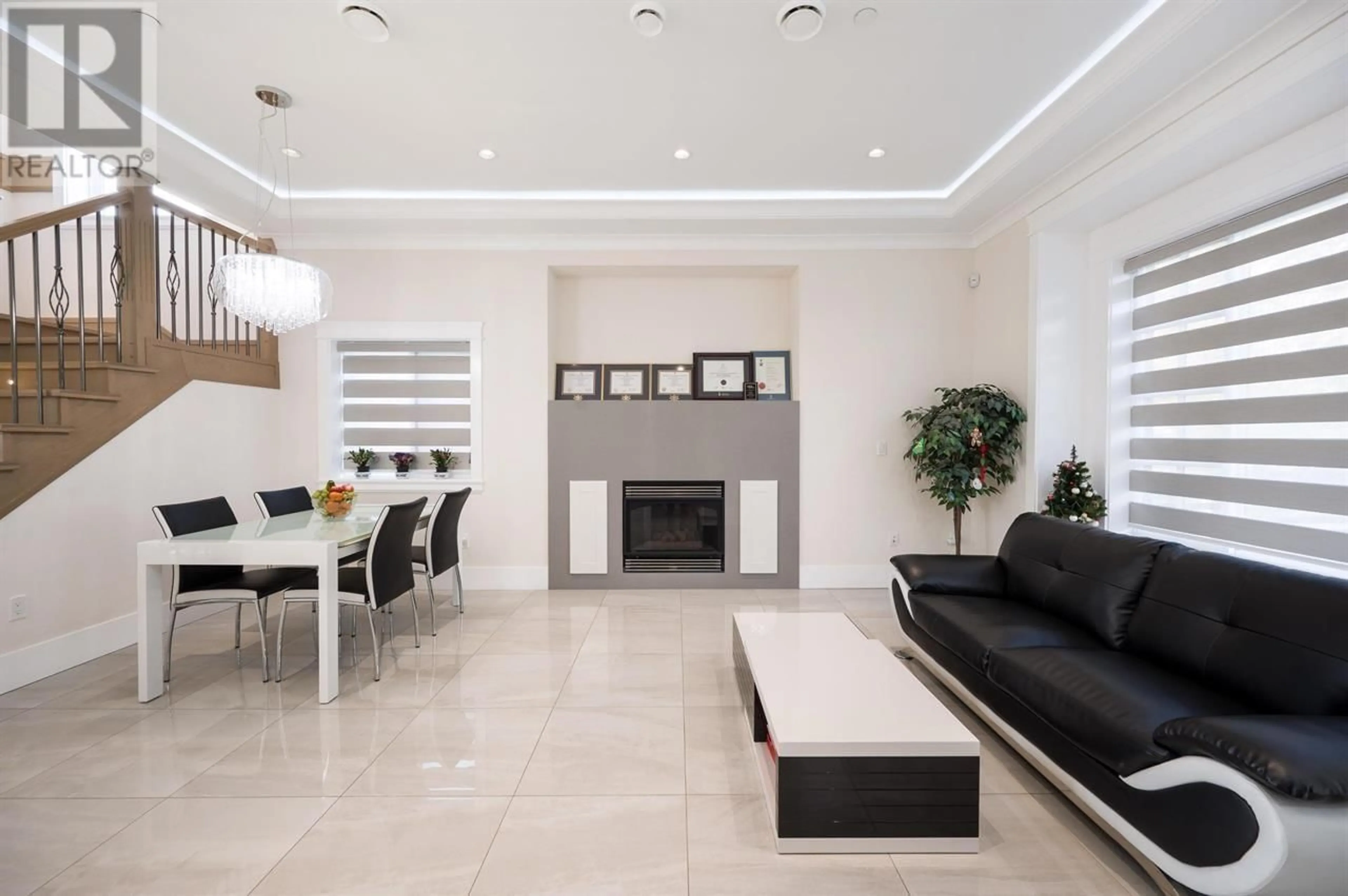 Living room with furniture, ceramic/tile floor for 488 62ND AVENUE, Vancouver British Columbia V5X2G1