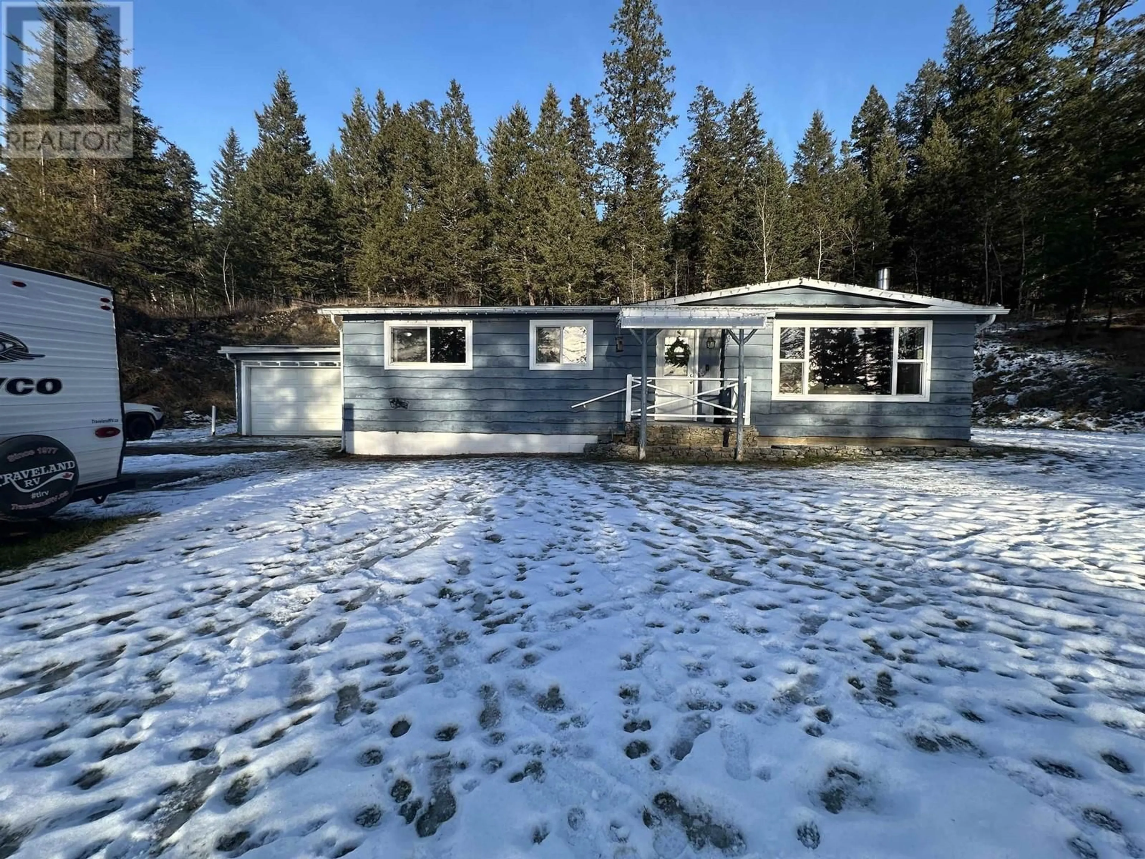 A pic from outside/outdoor area/front of a property/back of a property/a pic from drone, unknown for 130 LIKELY ROAD, 150 Mile House British Columbia V2G2G0