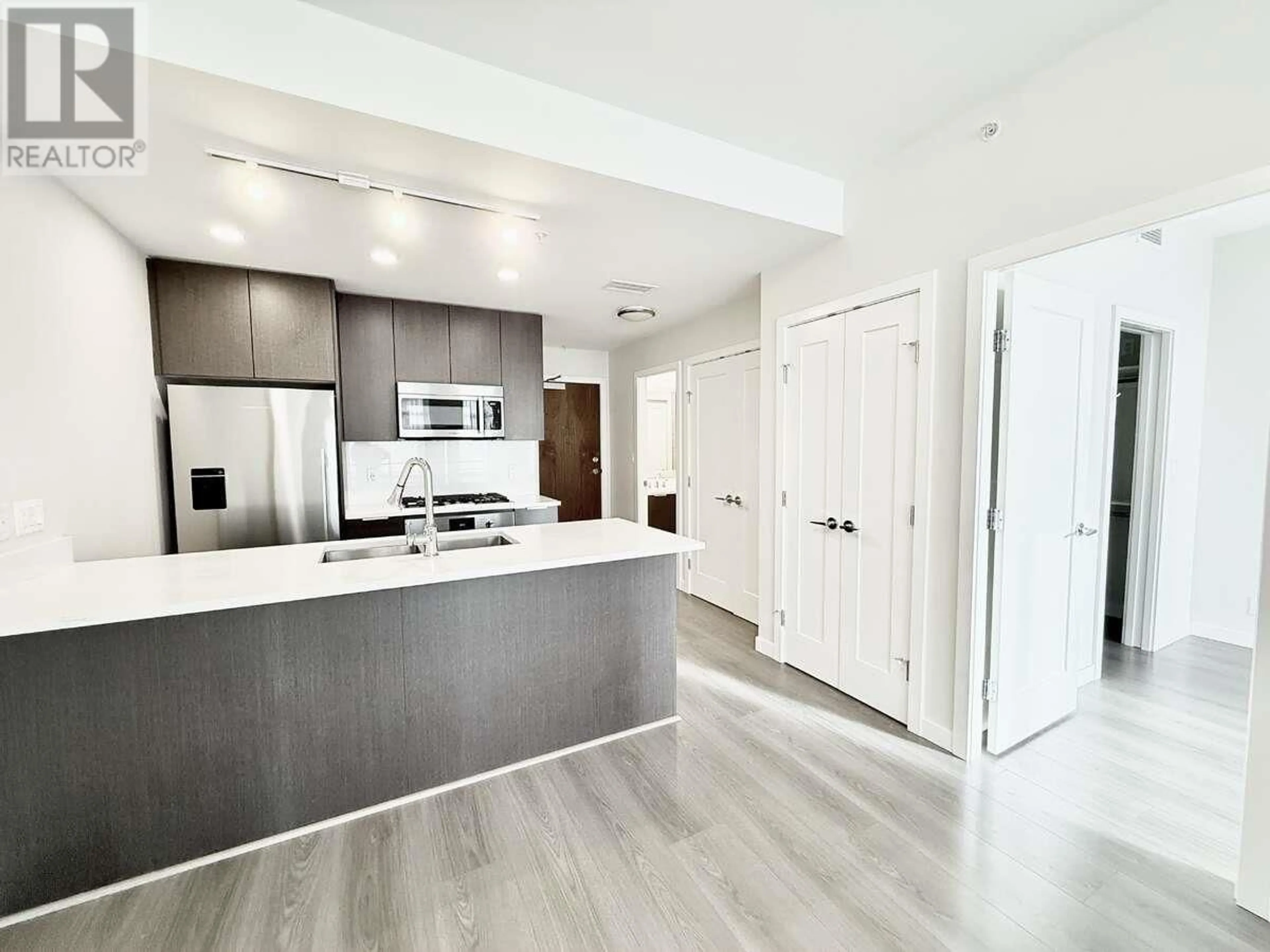 Open concept kitchen, unknown for 1204 - 8699 HAZELBRIDGE WAY, Richmond British Columbia V6X0T4