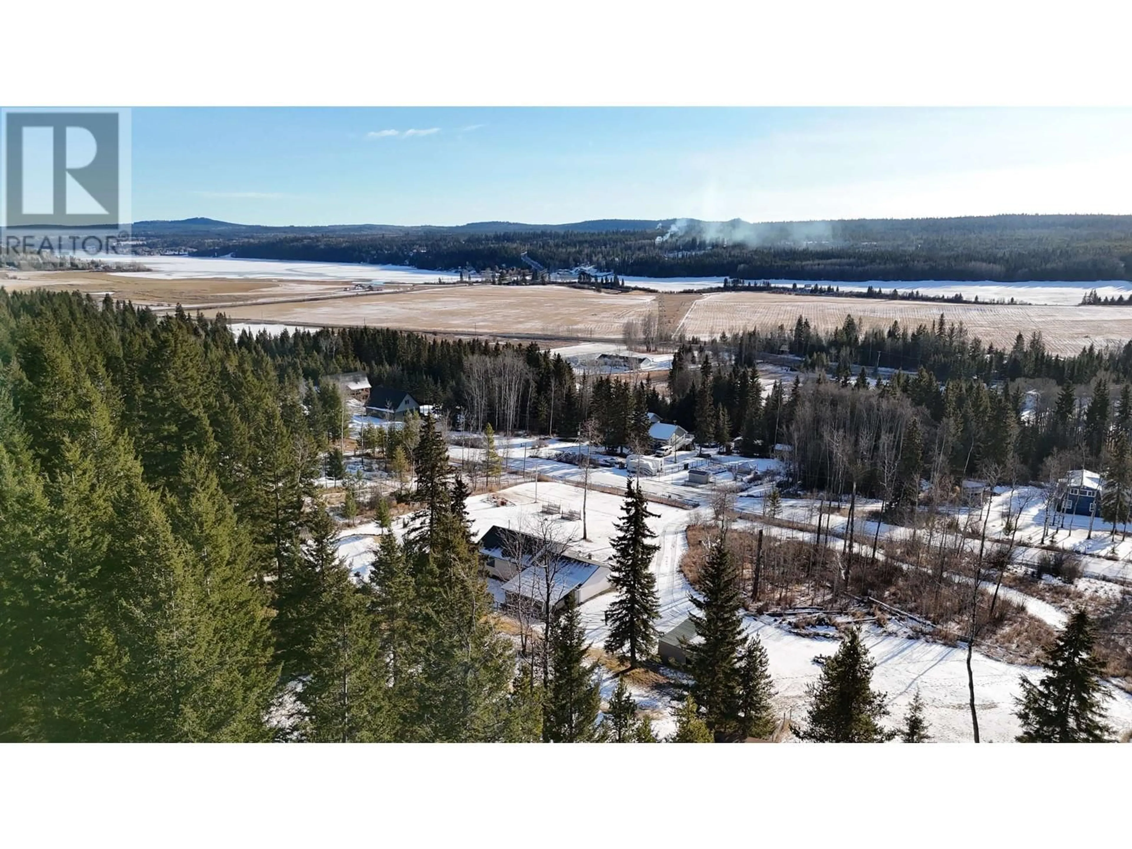 A pic from outside/outdoor area/front of a property/back of a property/a pic from drone, unknown for 5989 VALLEYVIEW DRIVE, Horse Lake British Columbia V0K2E3