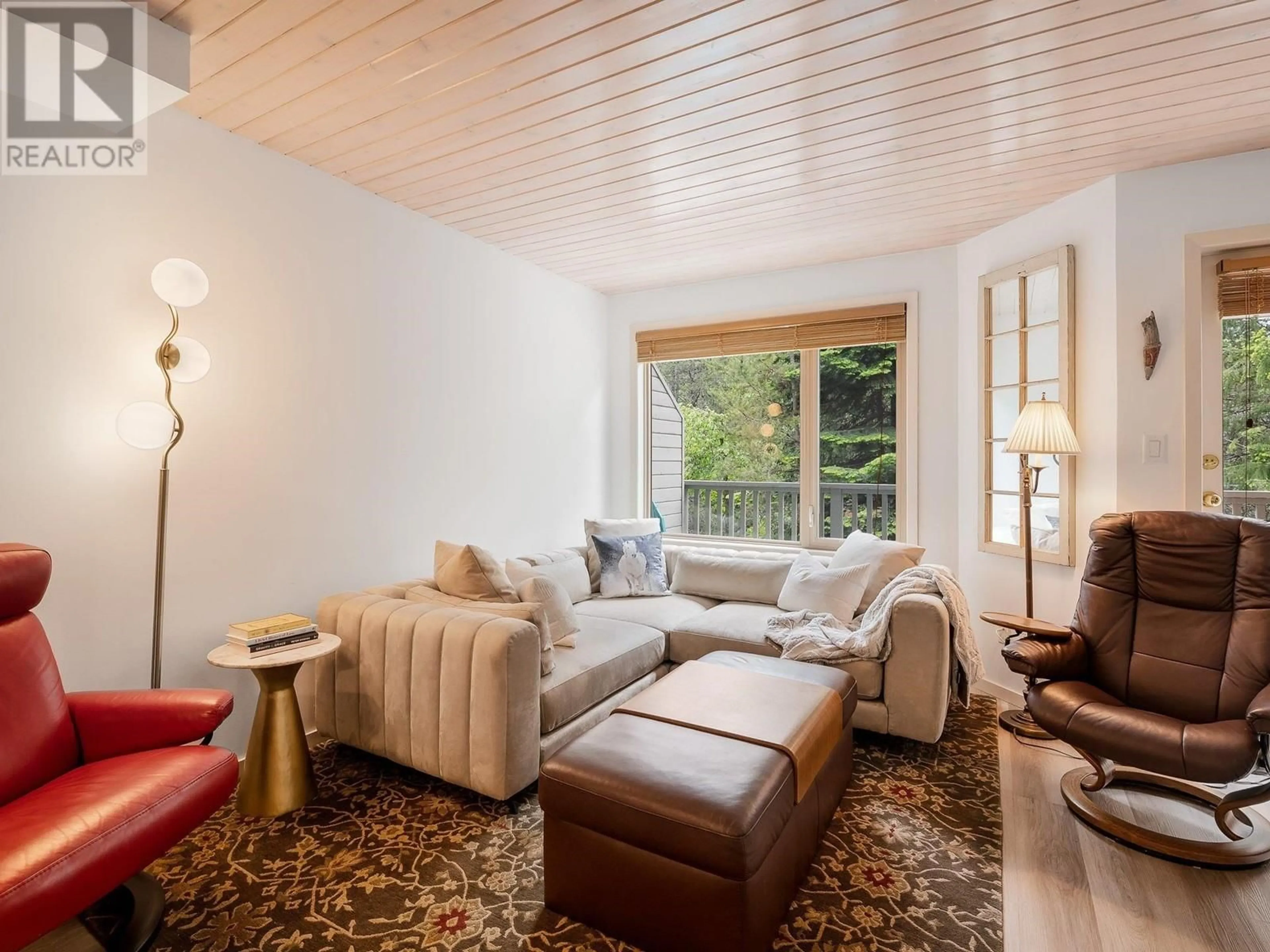 Living room with furniture, wood/laminate floor for 135 1200 ALTA LAKE ROAD, Whistler British Columbia V8E0H4