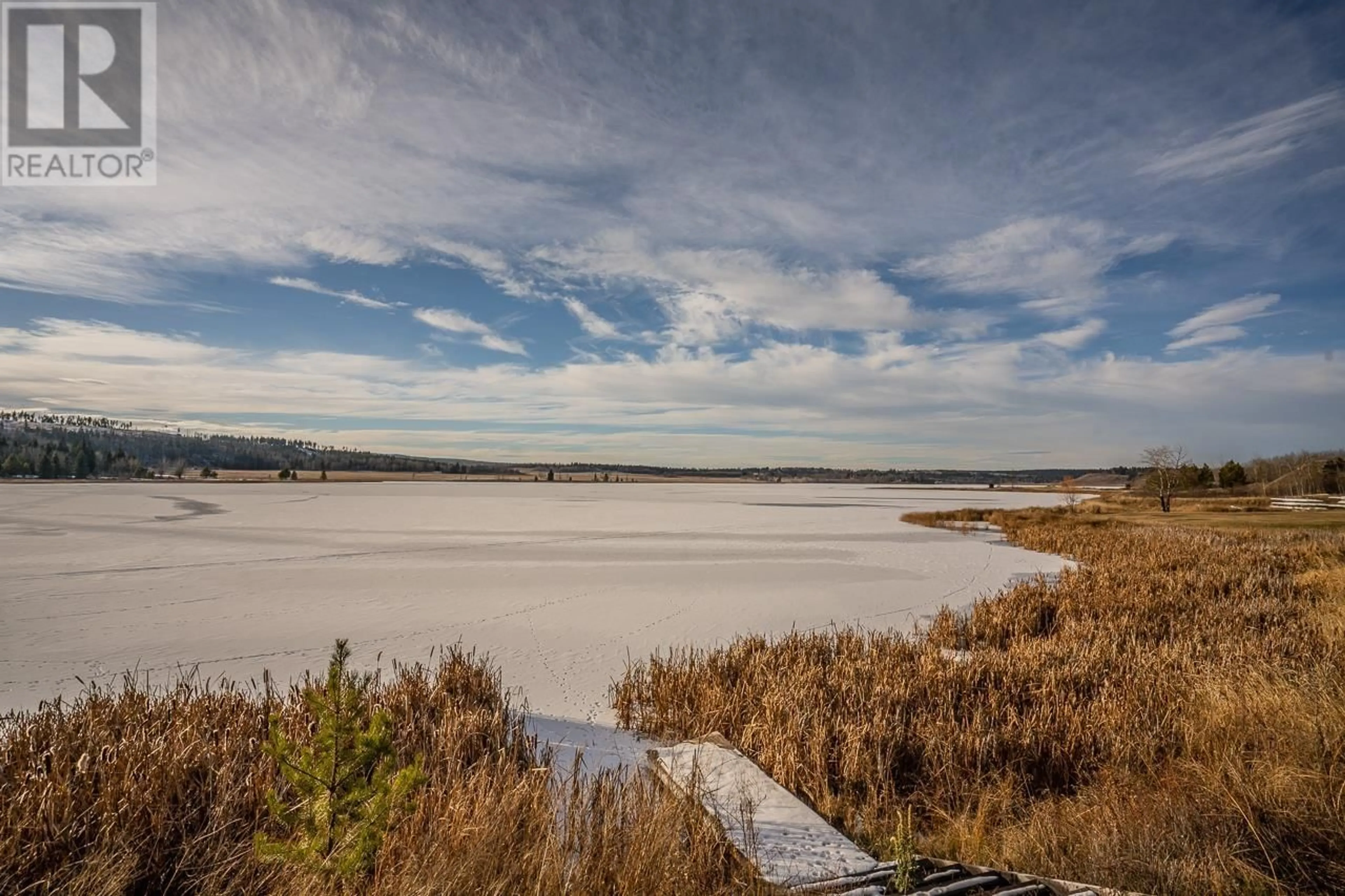 A pic from outside/outdoor area/front of a property/back of a property/a pic from drone, water/lake/river/ocean view for 5452 CARLSON ROAD, 100 Mile House British Columbia V0K2E1