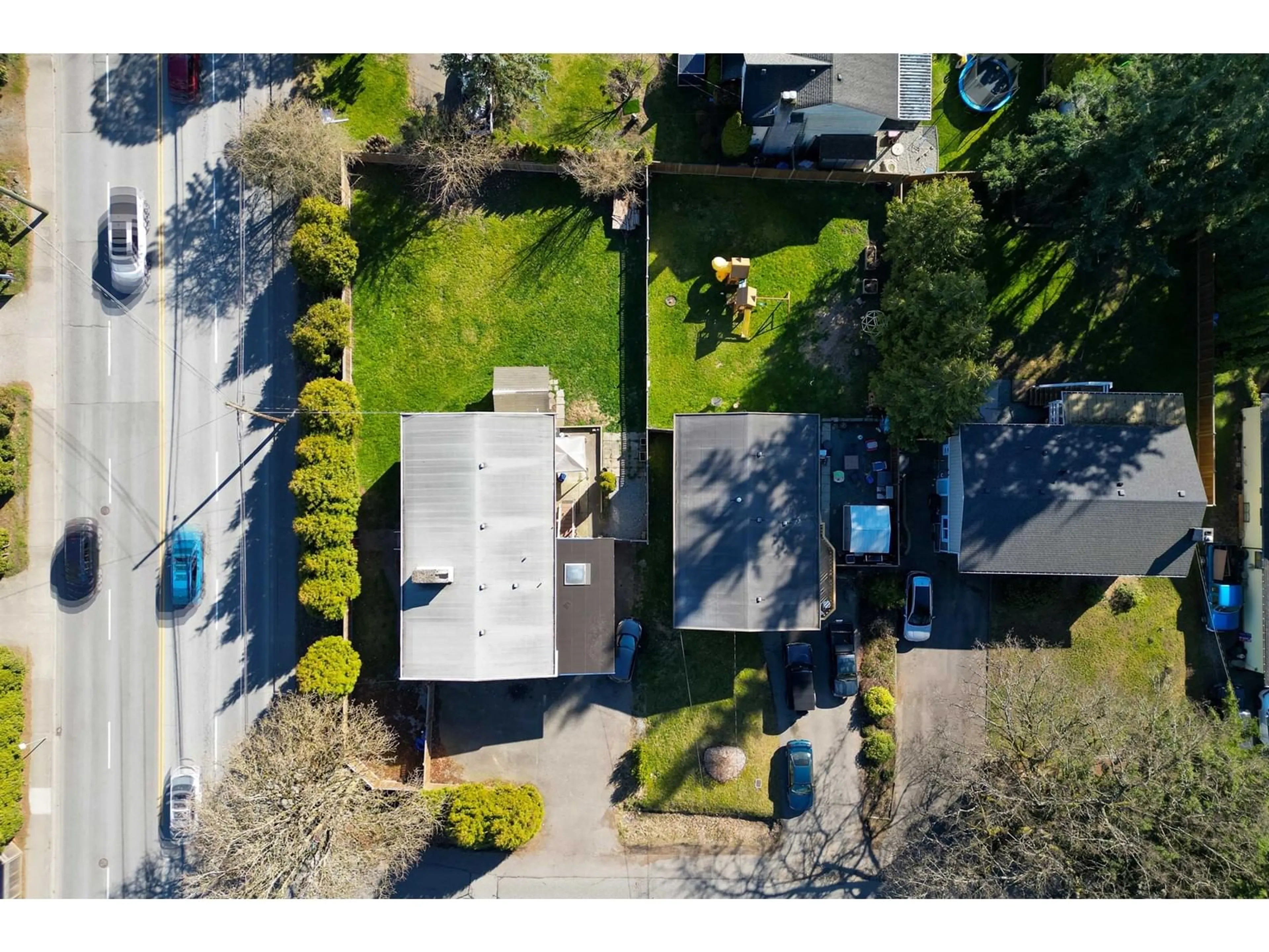 A pic from outside/outdoor area/front of a property/back of a property/a pic from drone, street for 4887 200 STREET, Langley British Columbia V3A1L6