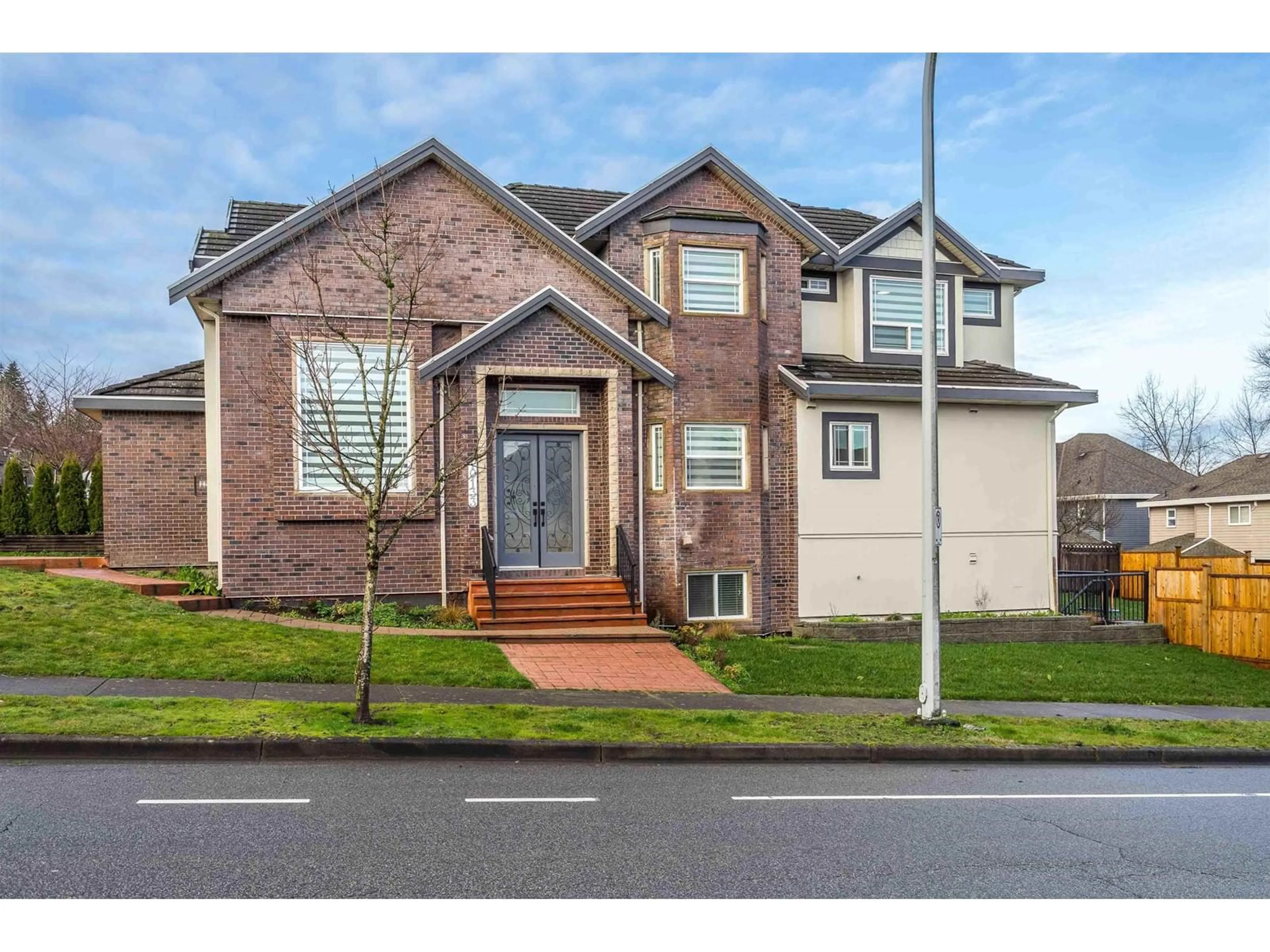 Home with brick exterior material, street for 10133 177A STREET, Surrey British Columbia V4N5V7