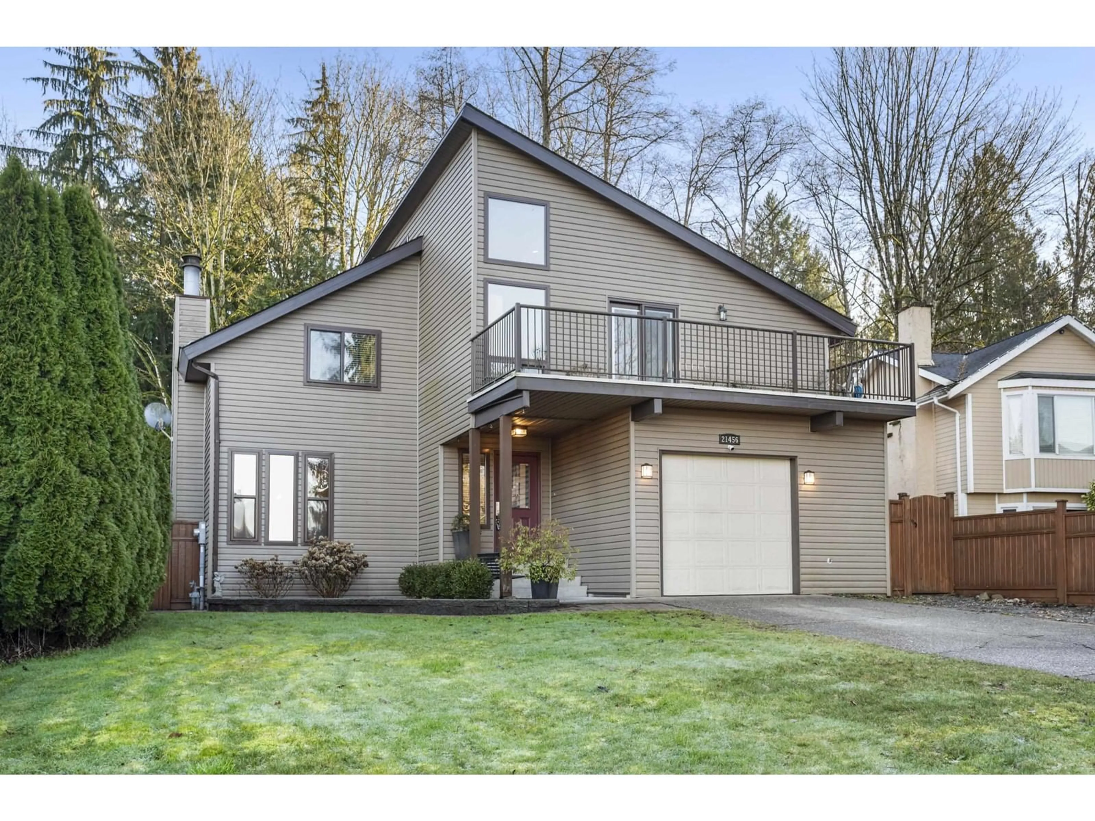 Home with vinyl exterior material, street for 21456 92B AVENUE, Langley British Columbia V1M1P4