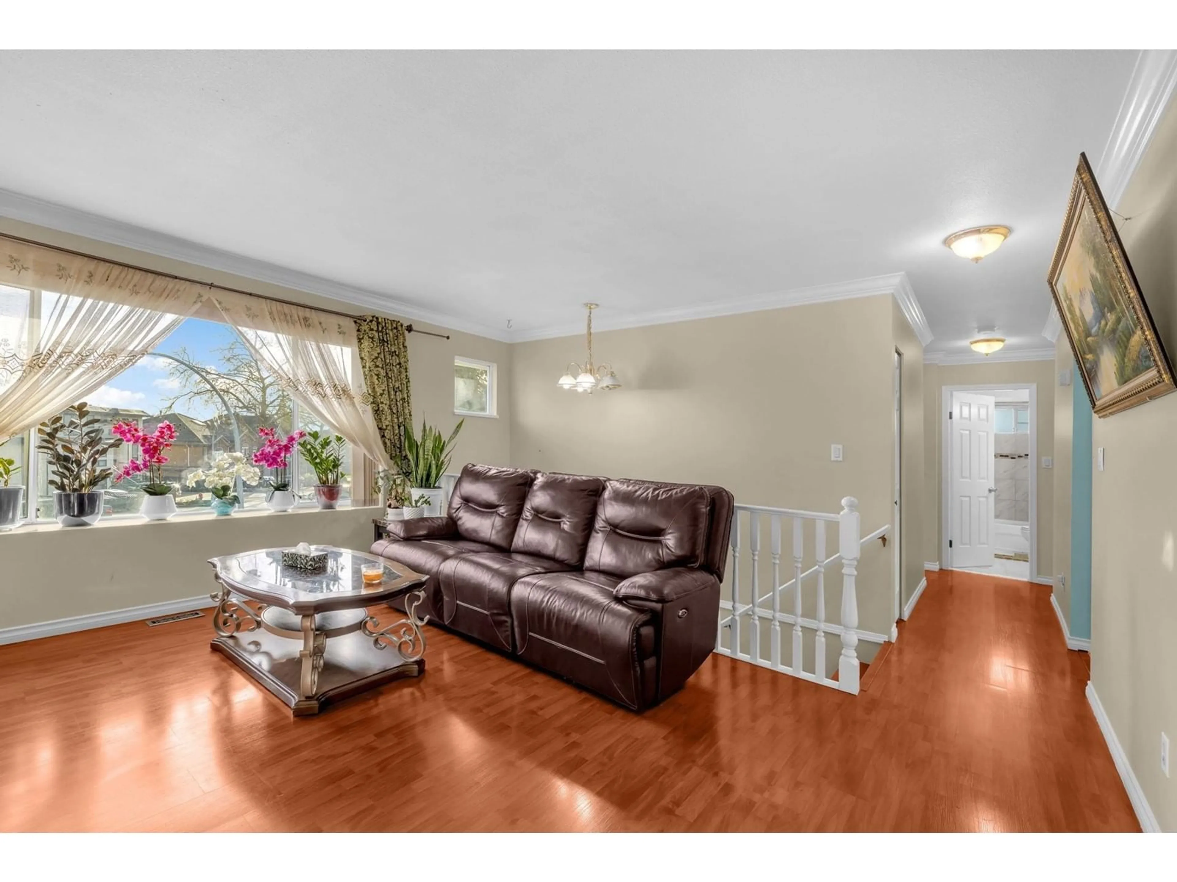 Living room with furniture, wood/laminate floor for 9125 SNOWDON PLACE, Surrey British Columbia V3V7T5