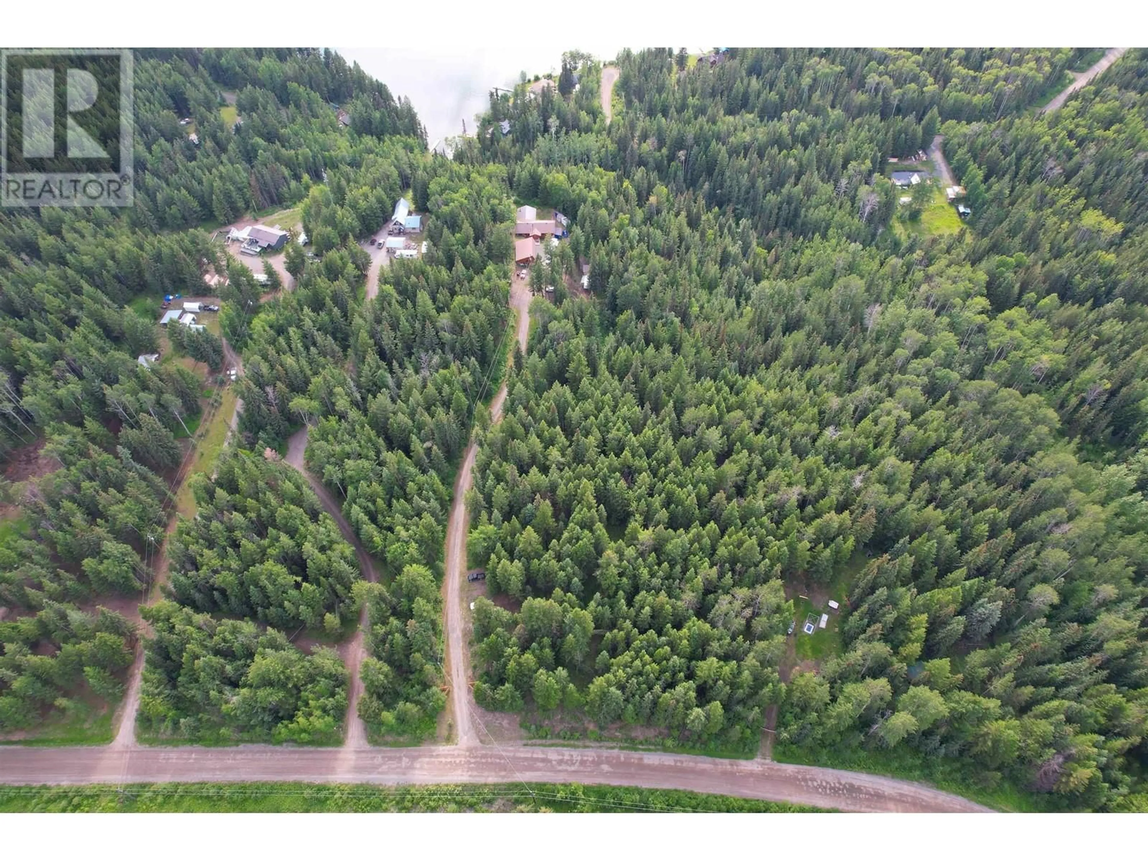 A pic from outside/outdoor area/front of a property/back of a property/a pic from drone, forest/trees view for 7524 THOMAS POINT ROAD, 100 Mile House British Columbia V0K1X1