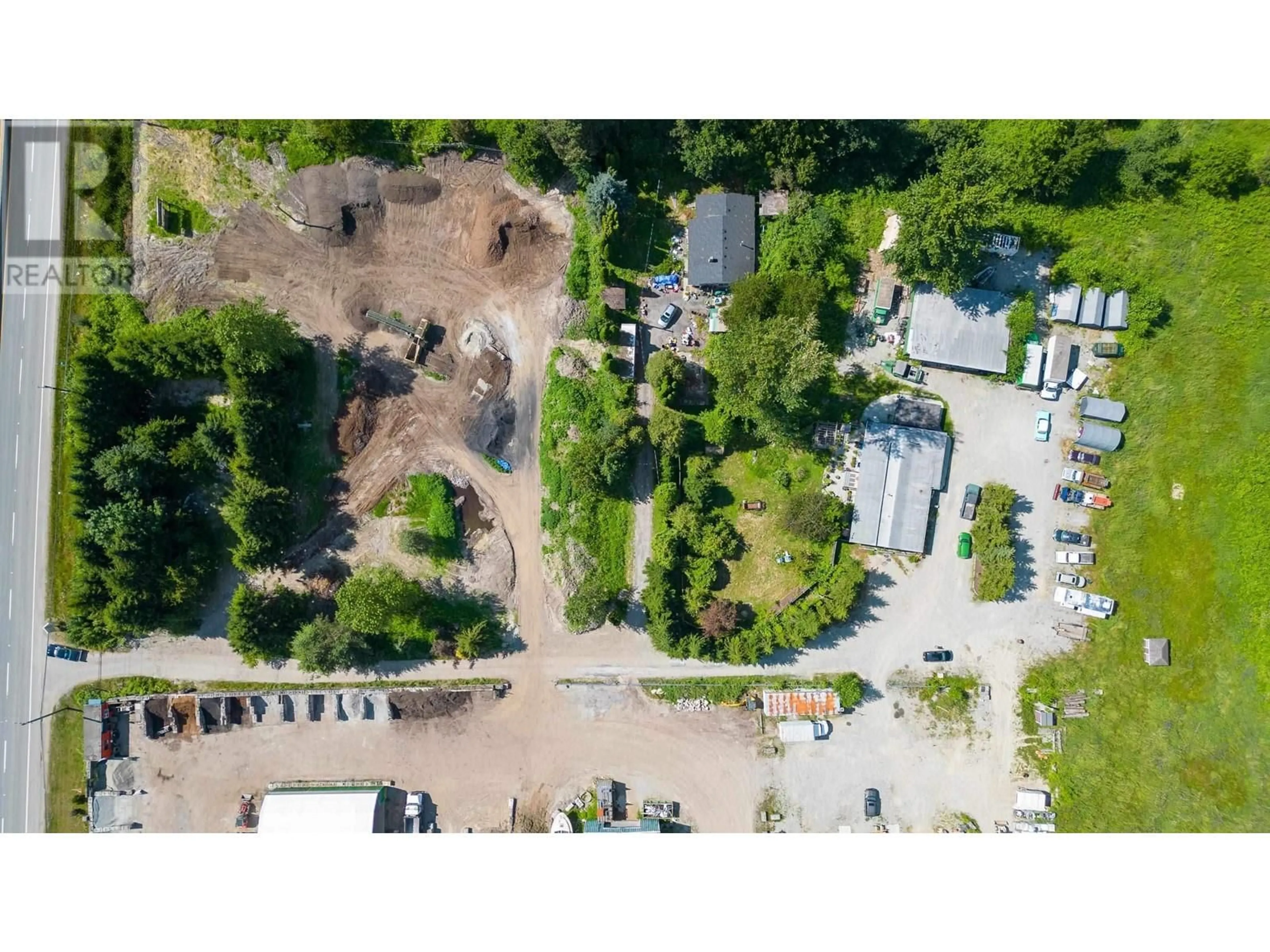 A pic from outside/outdoor area/front of a property/back of a property/a pic from drone, street for 23519 LOUGHEED HIGHWAY, Maple Ridge British Columbia V2W1B8