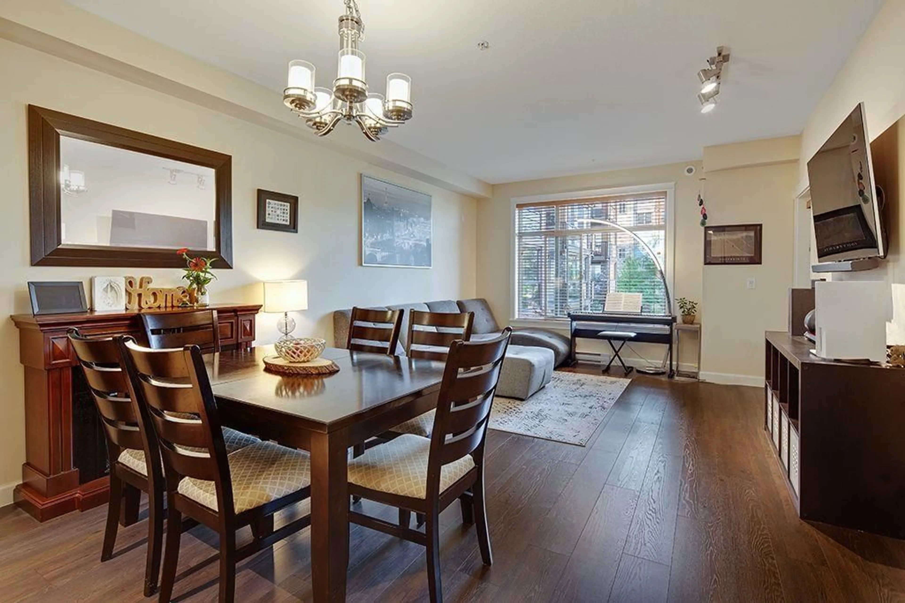 Dining room, wood/laminate floor for A214 20716 WILLOUGHBY TOWN CENTRE DRIVE, Langley British Columbia V2Y3J7