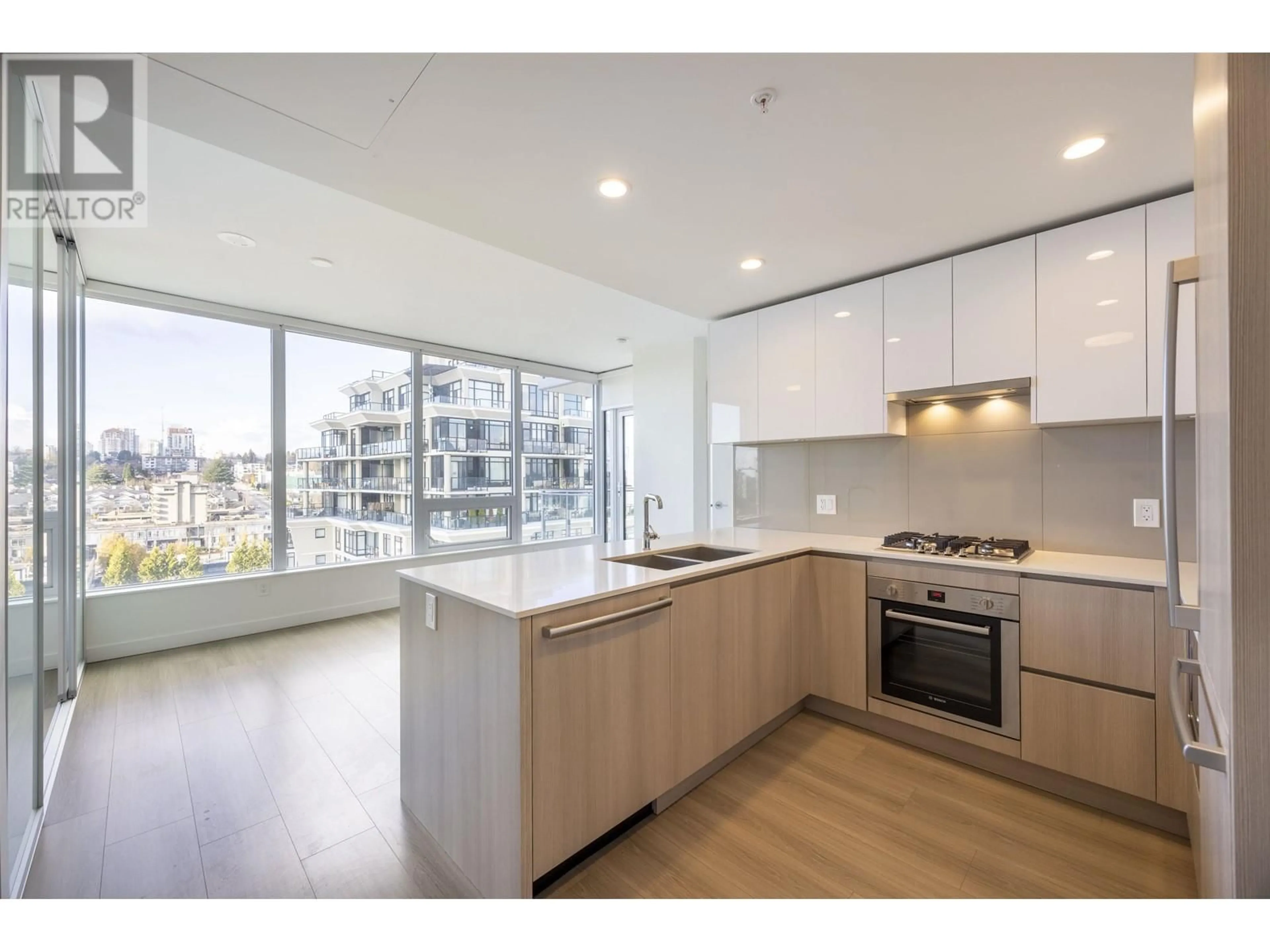 Open concept kitchen, wood/laminate floor for 2002 618 CARNARVON STREET, New Westminster British Columbia V3M1E9