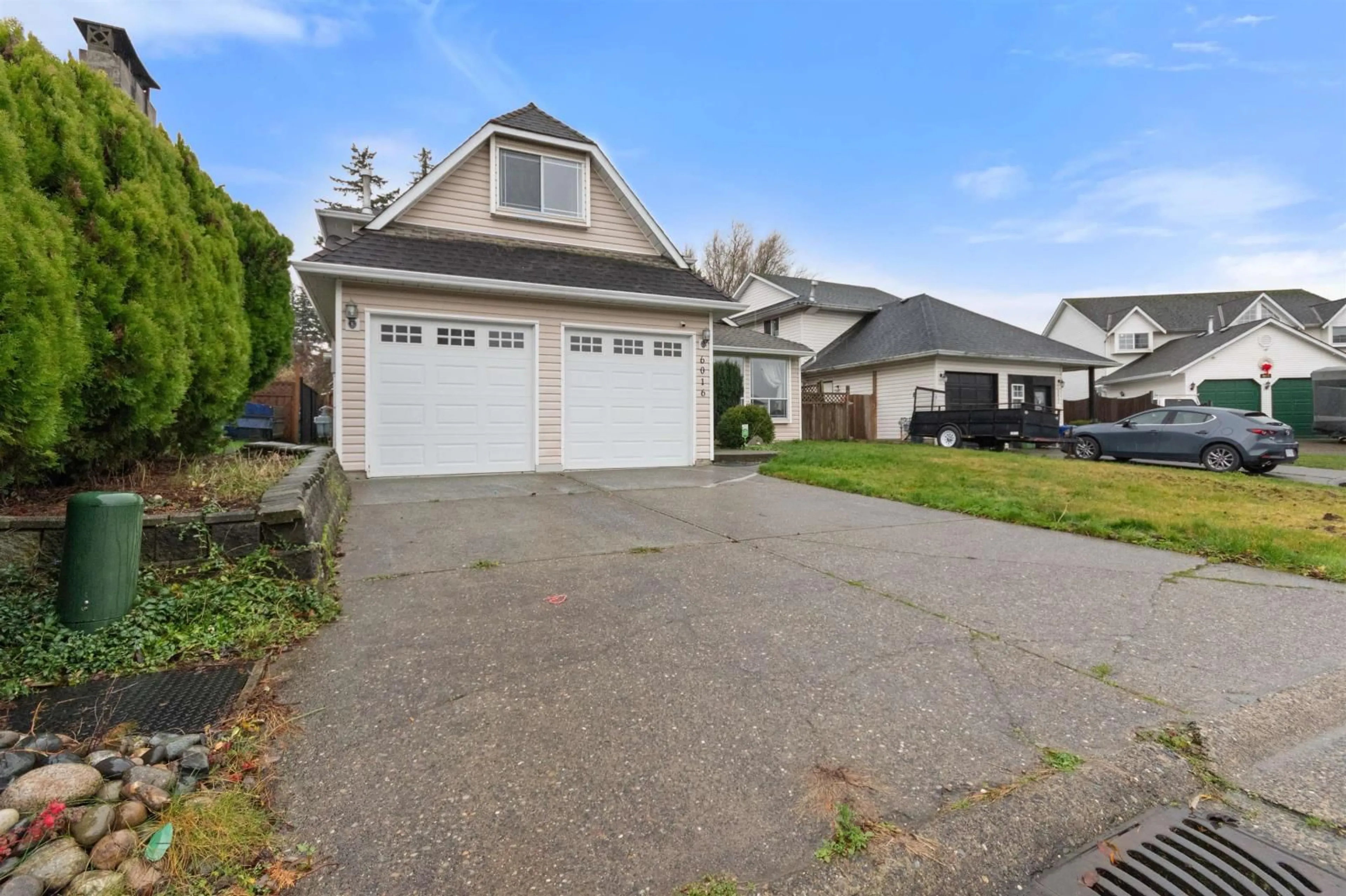 Home with vinyl exterior material, street for 6016 GLENGARRY DRIVE|Sardis South, Chilliwack British Columbia V2R2H8