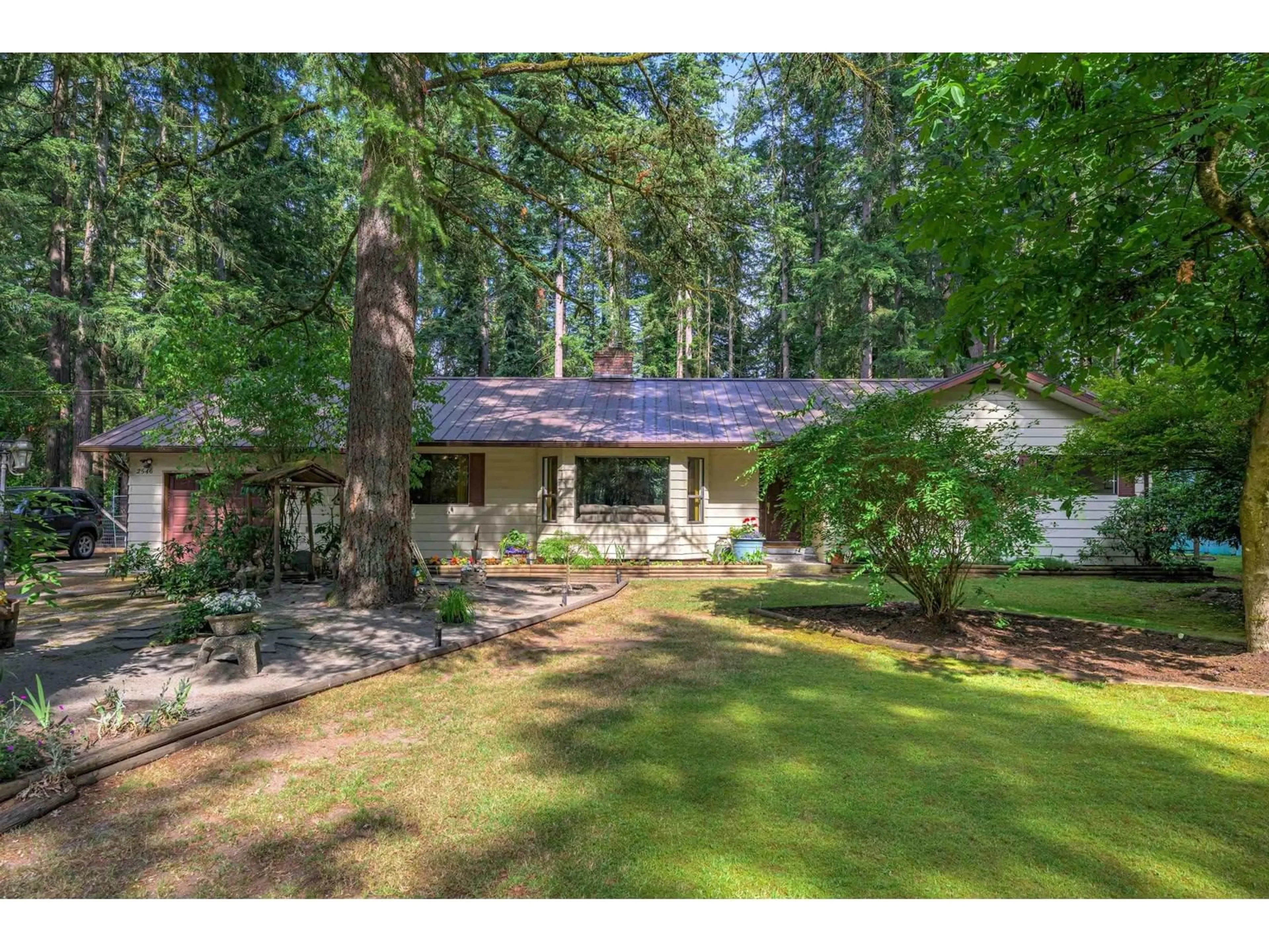 A pic from outside/outdoor area/front of a property/back of a property/a pic from drone, forest/trees view for 2546 200 STREET, Langley British Columbia V2Z1X1