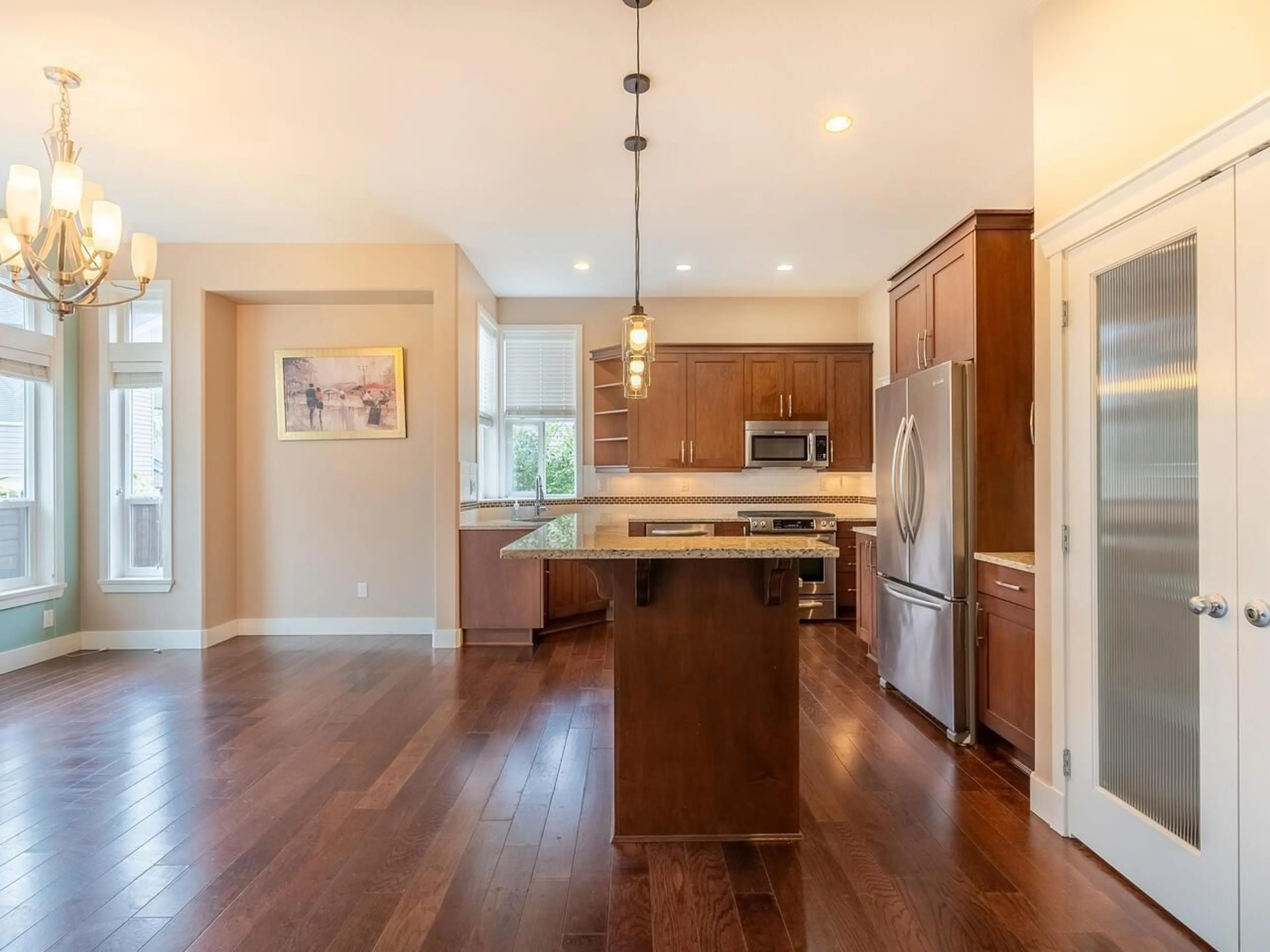 Open concept kitchen, wood/laminate floor for 7758 169A STREET, Surrey British Columbia V4N6L2