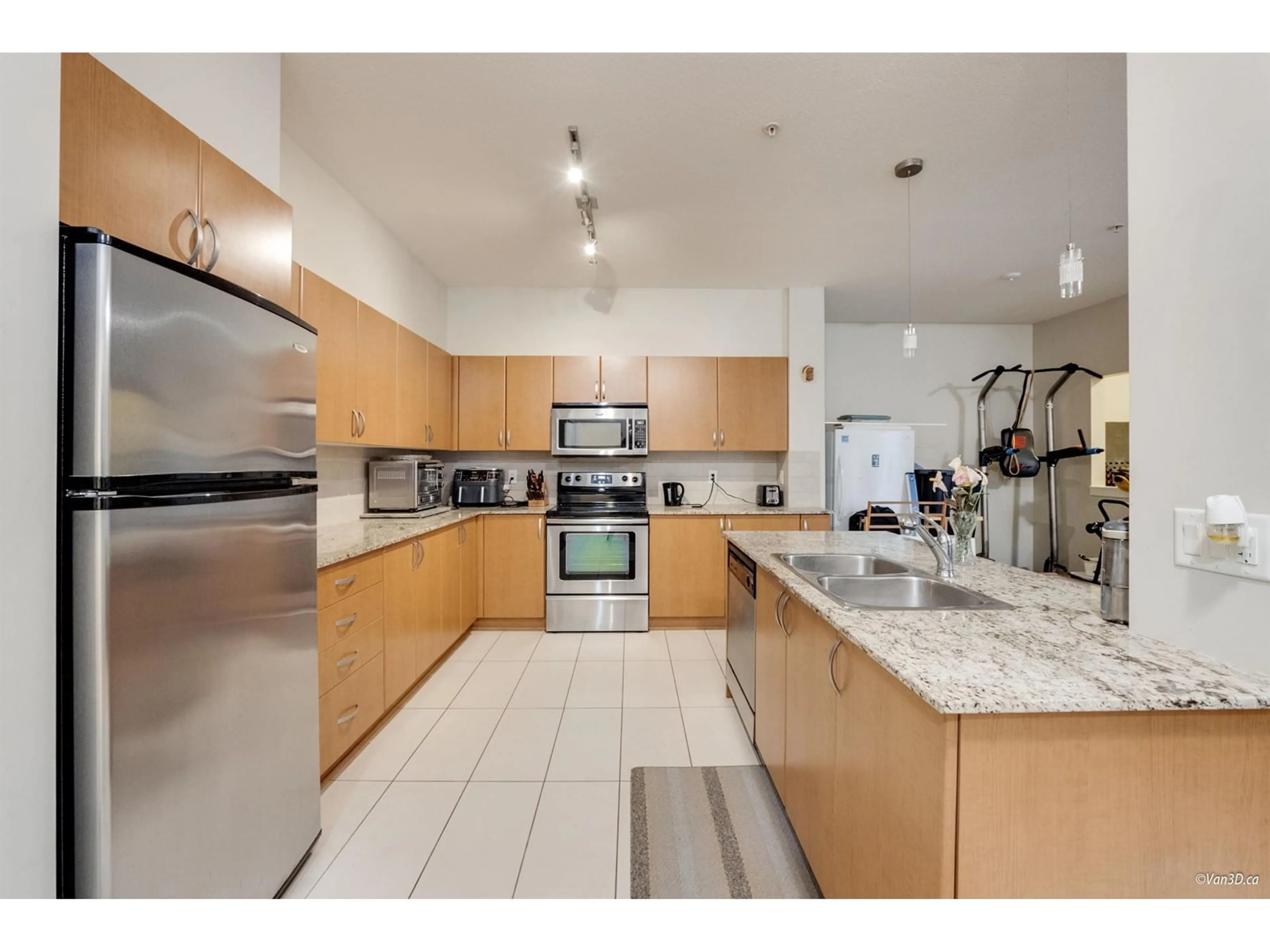 Open concept kitchen, ceramic/tile floor for 427 13733 107A AVENUE, Surrey British Columbia V3T0B7