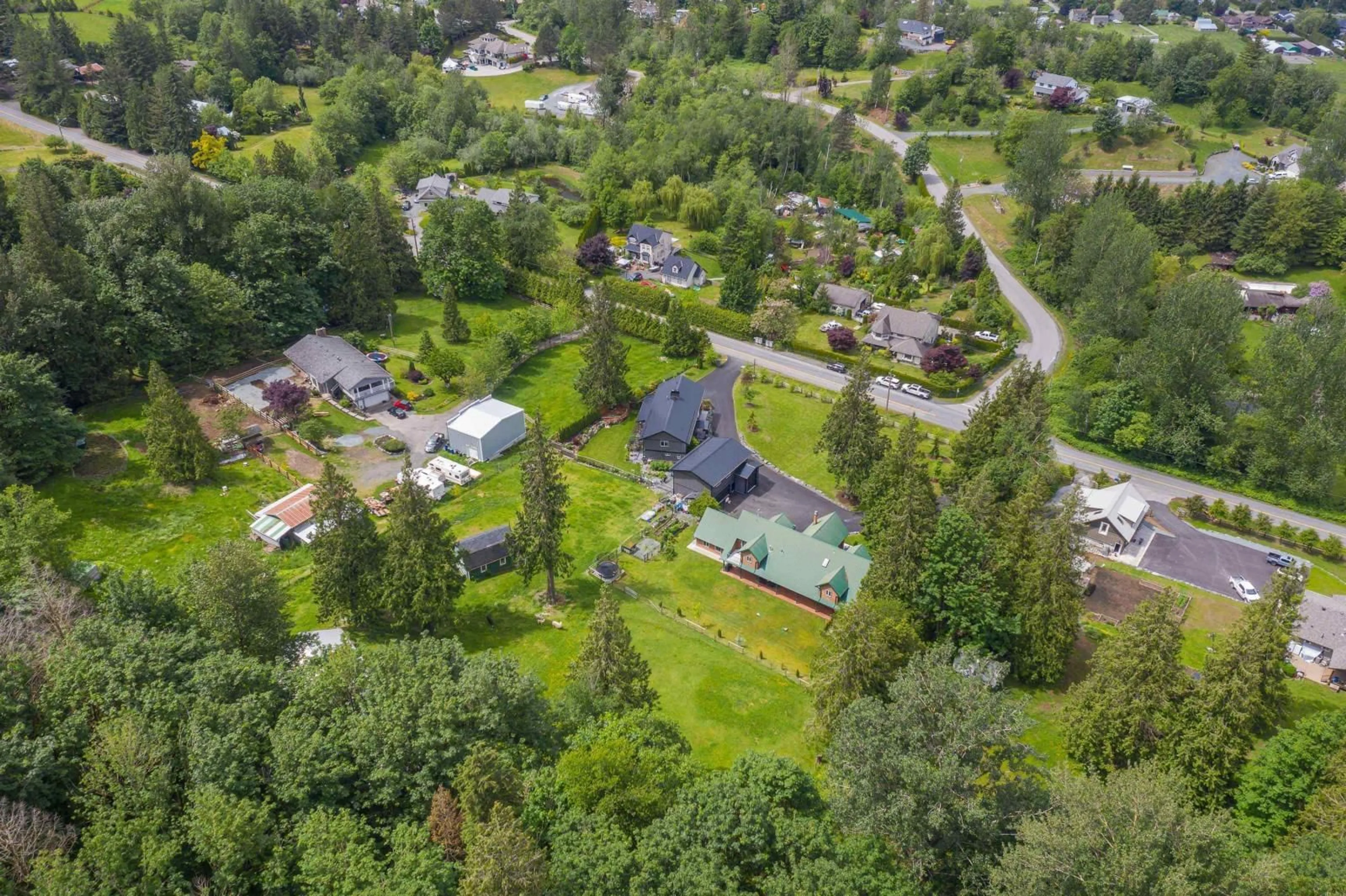 A pic from outside/outdoor area/front of a property/back of a property/a pic from drone, street for 42160 MAJUBA HILL ROAD, Chilliwack British Columbia V2R5H2