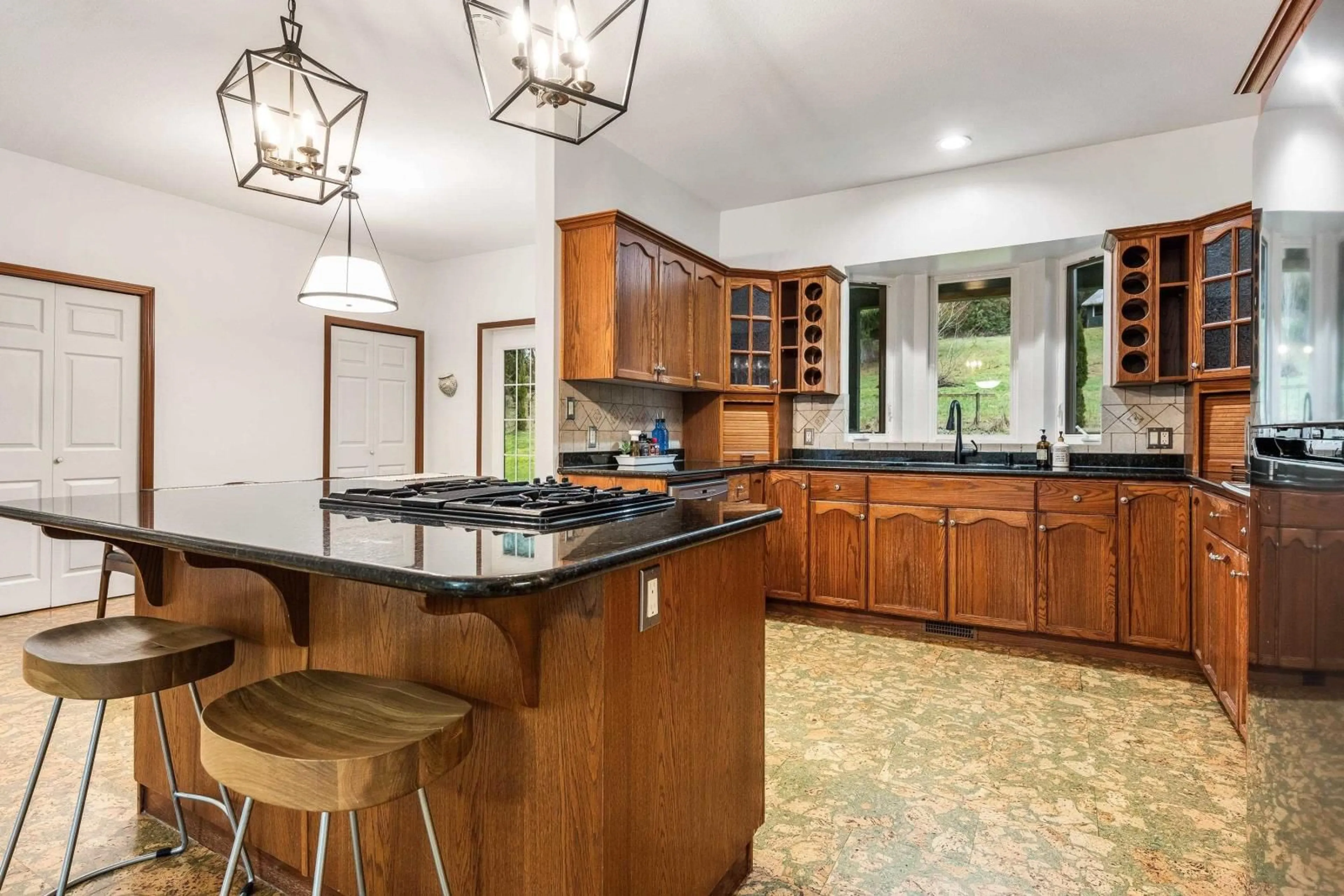 Open concept kitchen, ceramic/tile floor for 42160 MAJUBA HILL ROAD, Chilliwack British Columbia V2R5H2