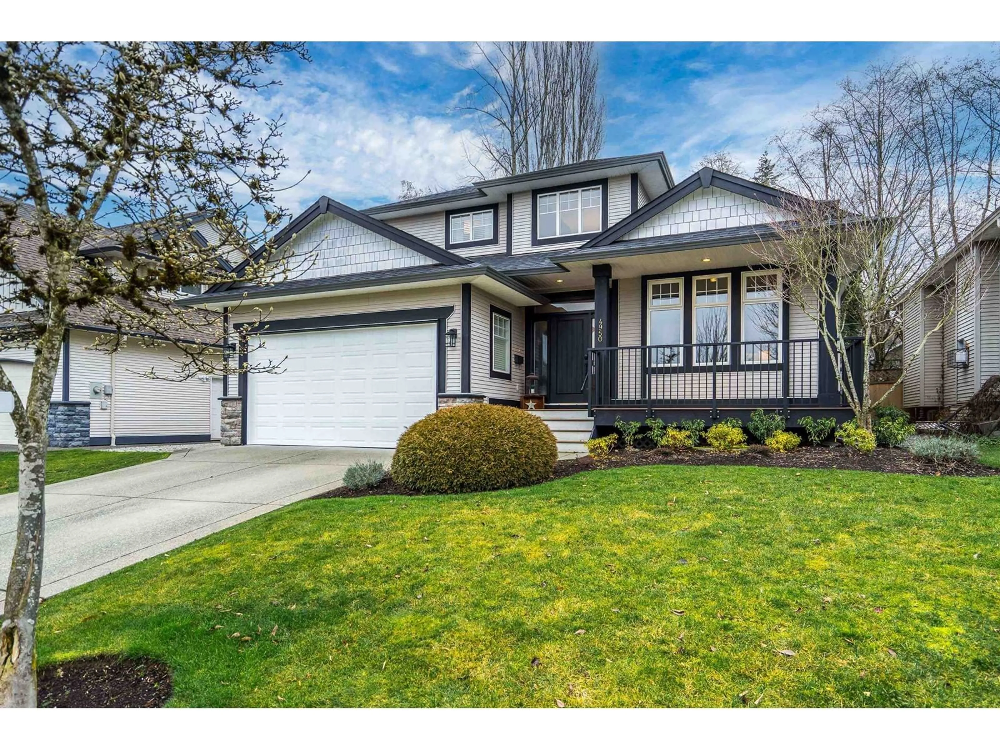 Home with vinyl exterior material, street for 4950 217B STREET, Langley British Columbia V3A9K1