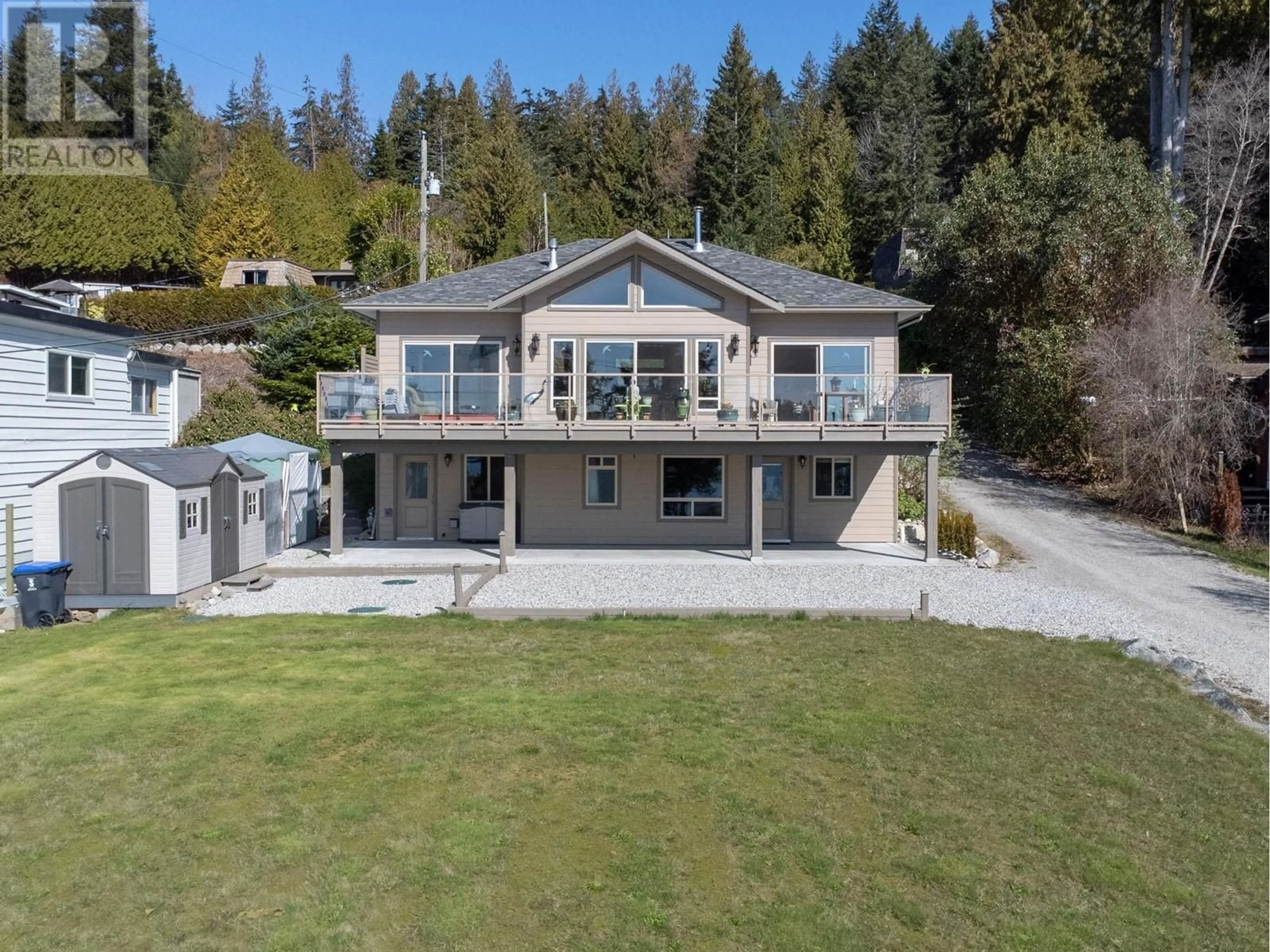 A pic from outside/outdoor area/front of a property/back of a property/a pic from drone, unknown for 6682 SUNSHINE COAST HIGHWAY, Sechelt British Columbia V0N3A8