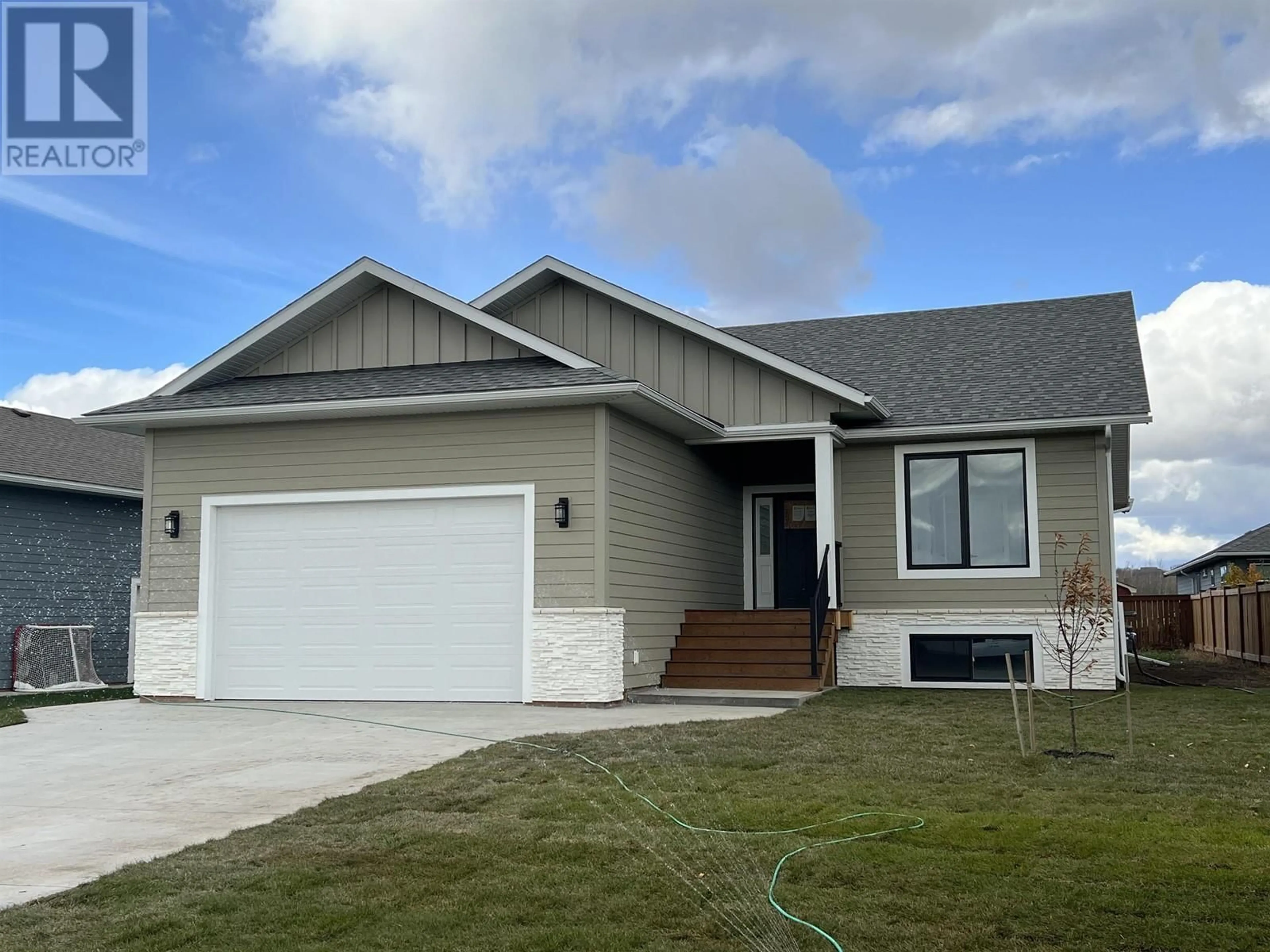 Home with vinyl exterior material, street for 11204 112 AVENUE, Fort St. John British Columbia V1J0R5