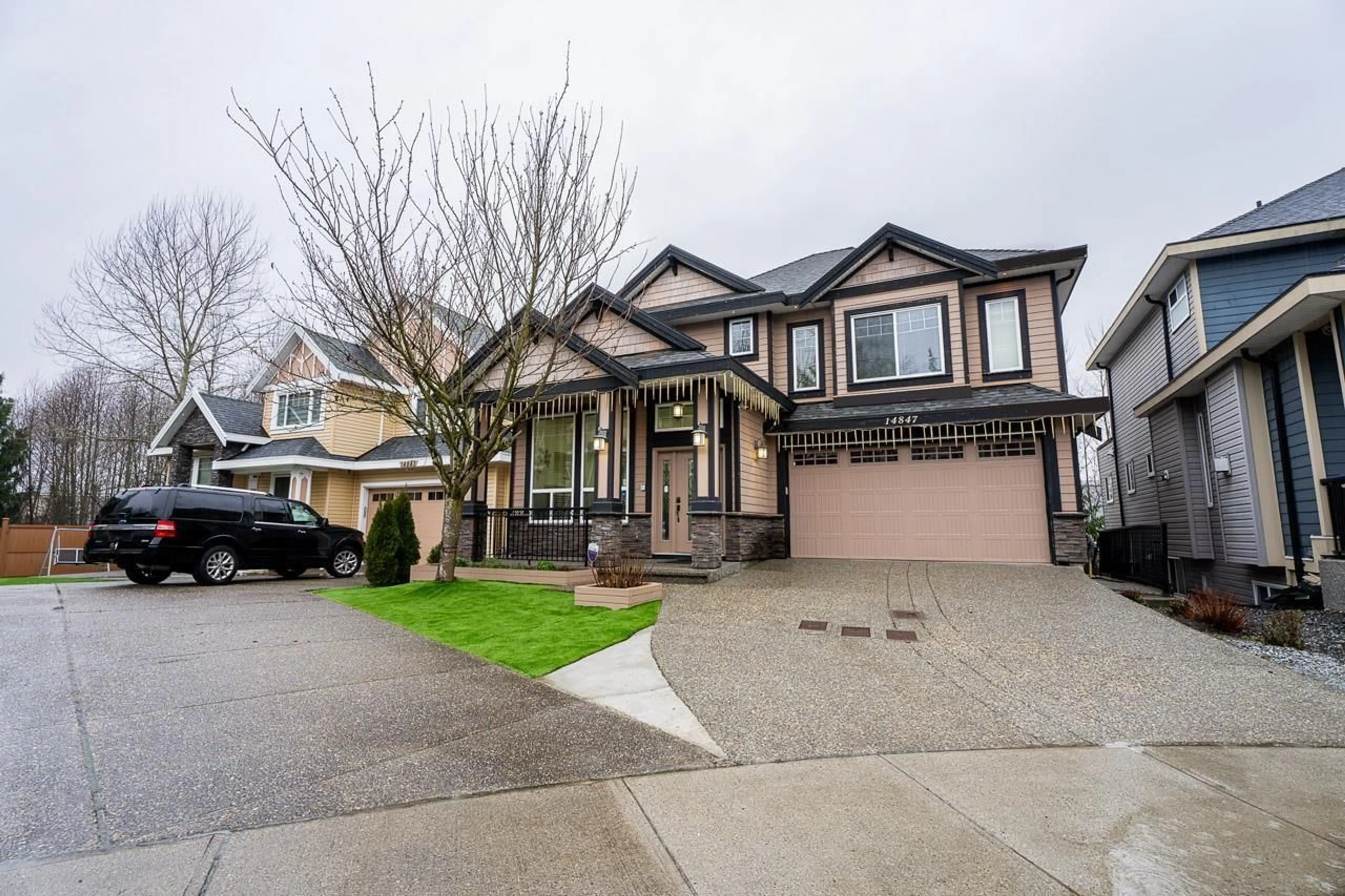 Home with vinyl exterior material, street for 14847 63 AVENUE, Surrey British Columbia V3S2W9