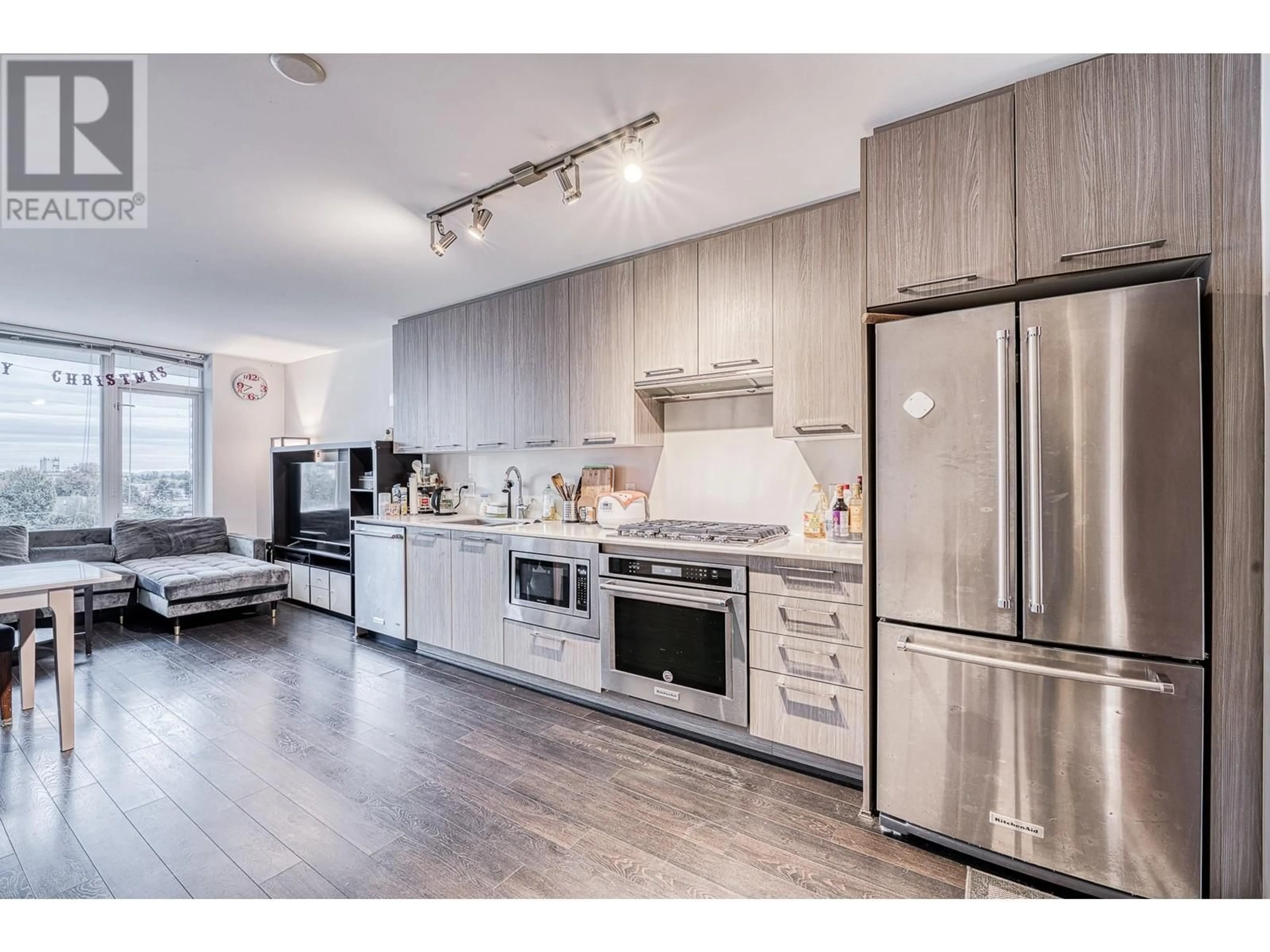 Open concept kitchen, wood/laminate floor for 805 7688 ALDERBRIDGE WAY, Richmond British Columbia V6X0P7