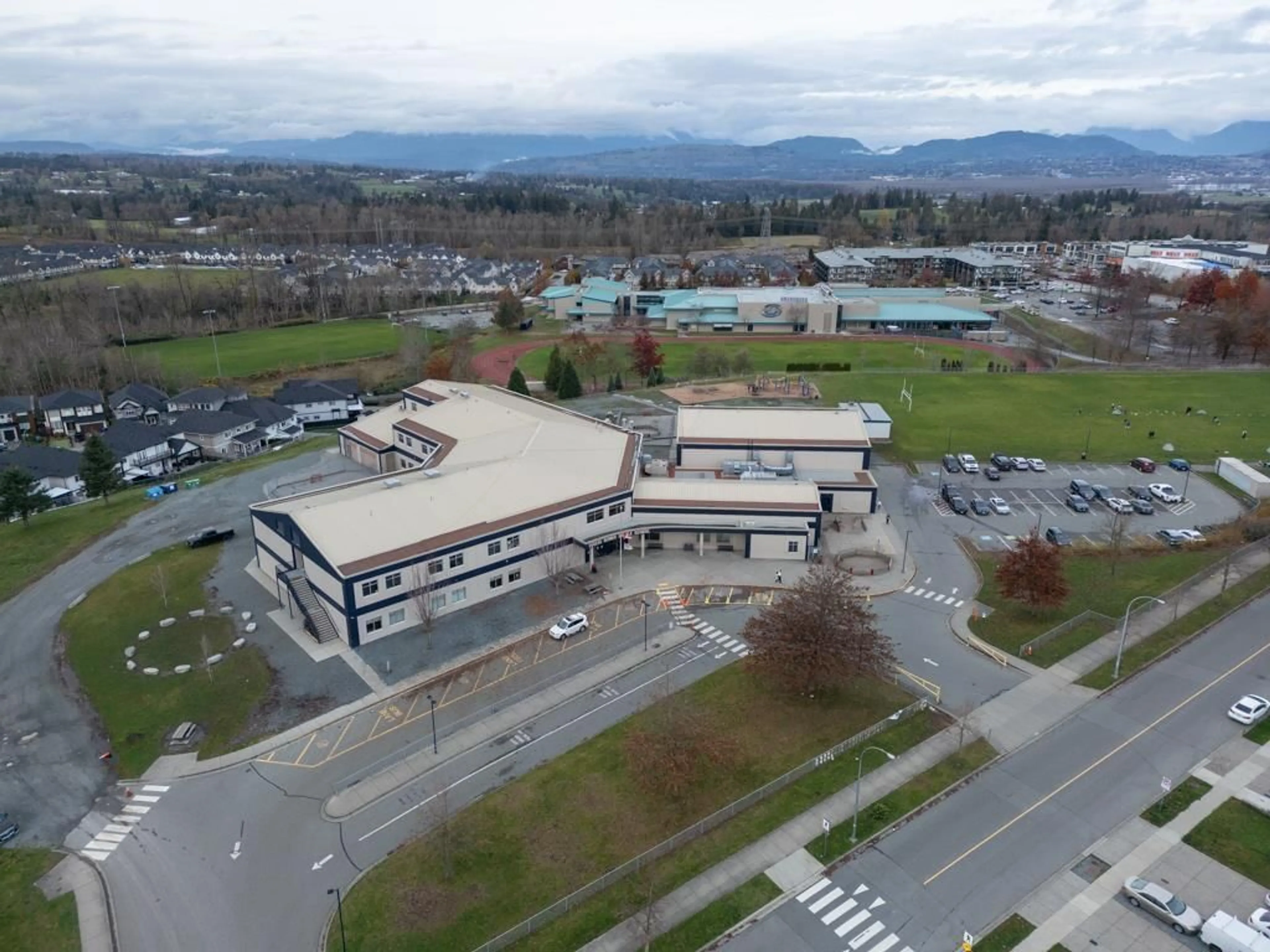 A pic from outside/outdoor area/front of a property/back of a property/a pic from drone, mountain view for 3412 HEADWATER, Abbotsford British Columbia V2T0G4
