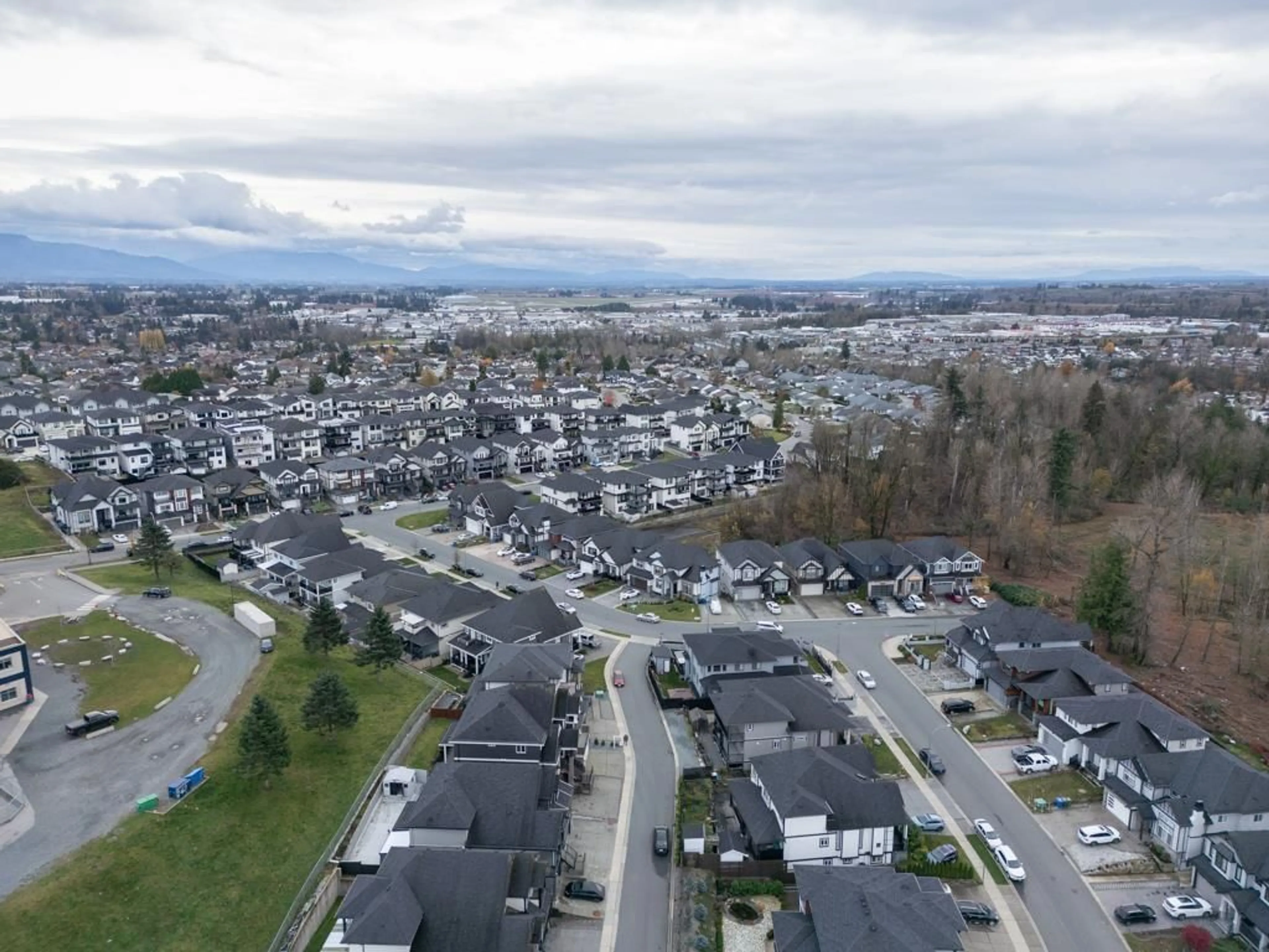 A pic from outside/outdoor area/front of a property/back of a property/a pic from drone, mountain view for 3412 HEADWATER, Abbotsford British Columbia V2T0G4