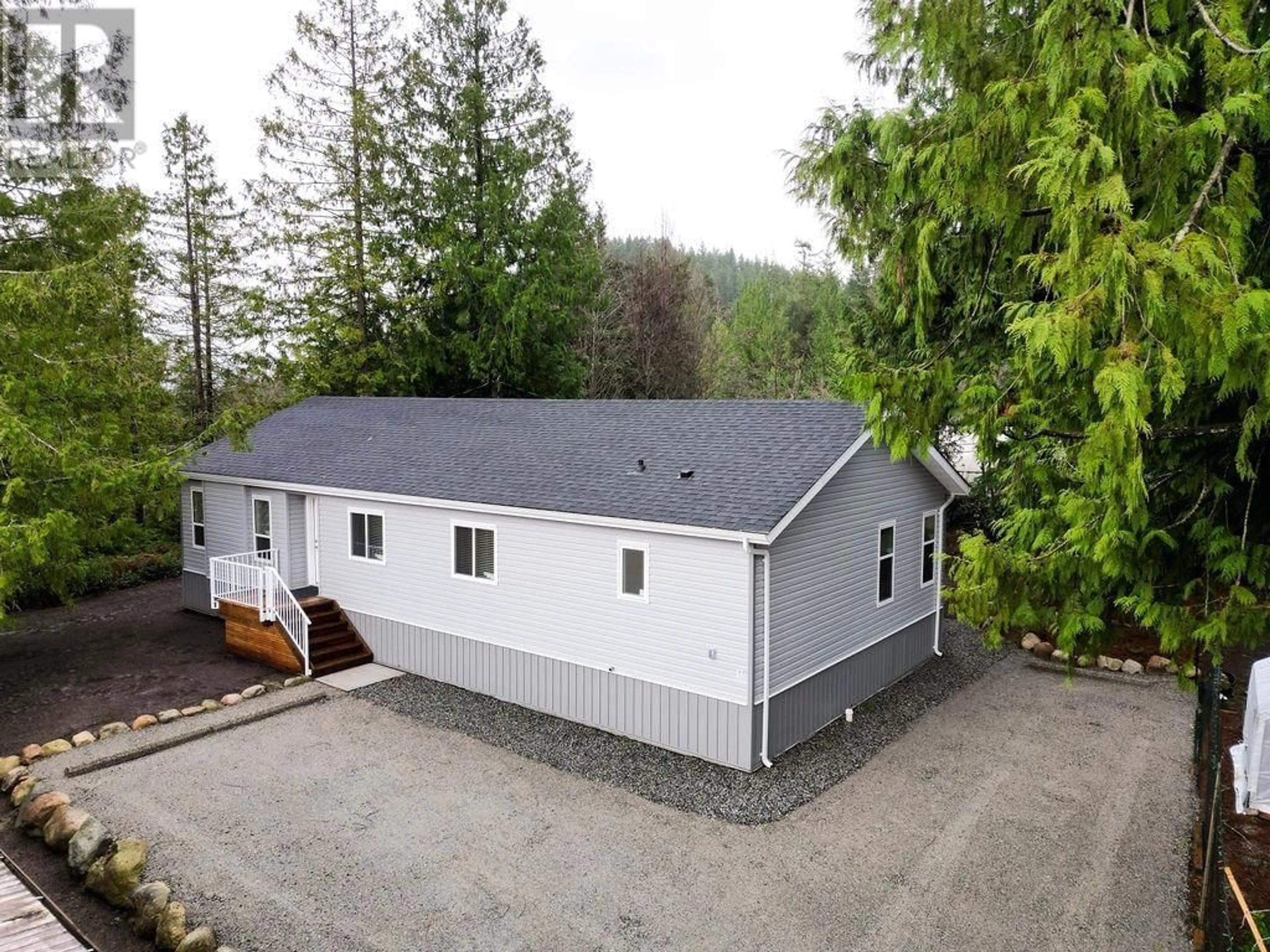 A pic from outside/outdoor area/front of a property/back of a property/a pic from drone, unknown for 11 1416 NORTH ROAD, Gibsons British Columbia V0N1V1