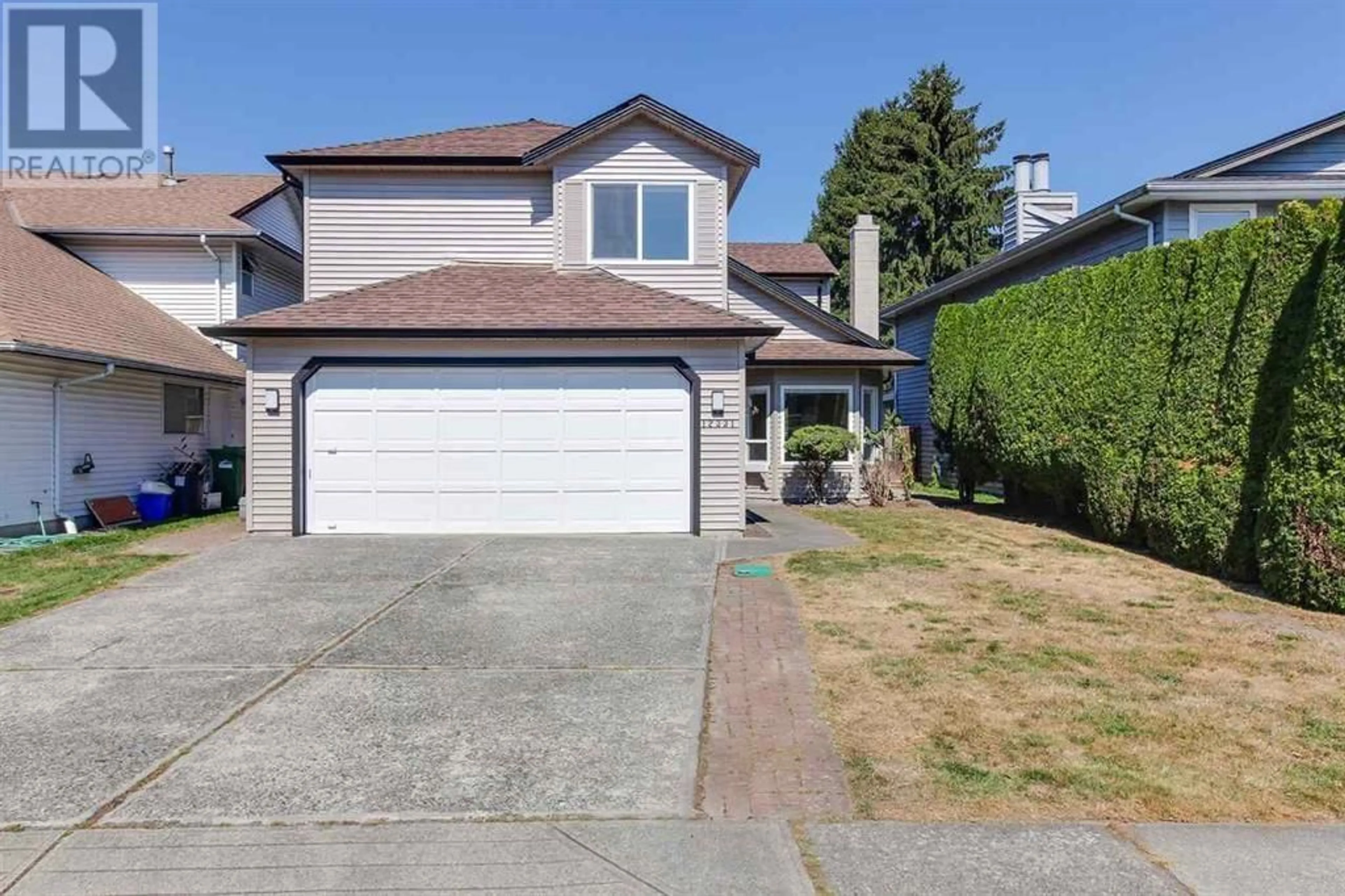 Home with vinyl exterior material, street for 12331 GREENLAND DRIVE, Richmond British Columbia V6V2A7