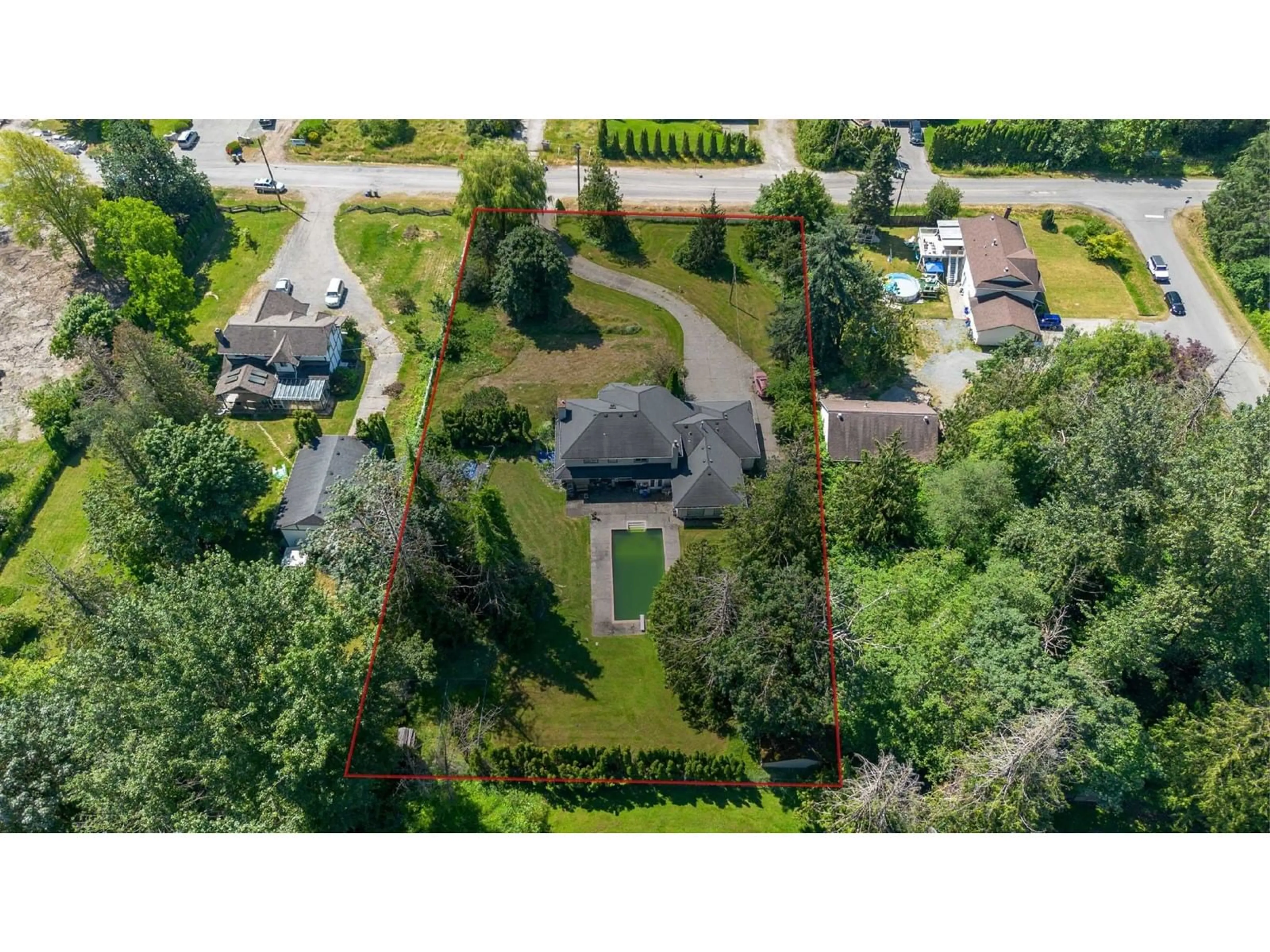 A pic from outside/outdoor area/front of a property/back of a property/a pic from drone, street for 20745 68 AVENUE, Langley British Columbia V2Y1R1