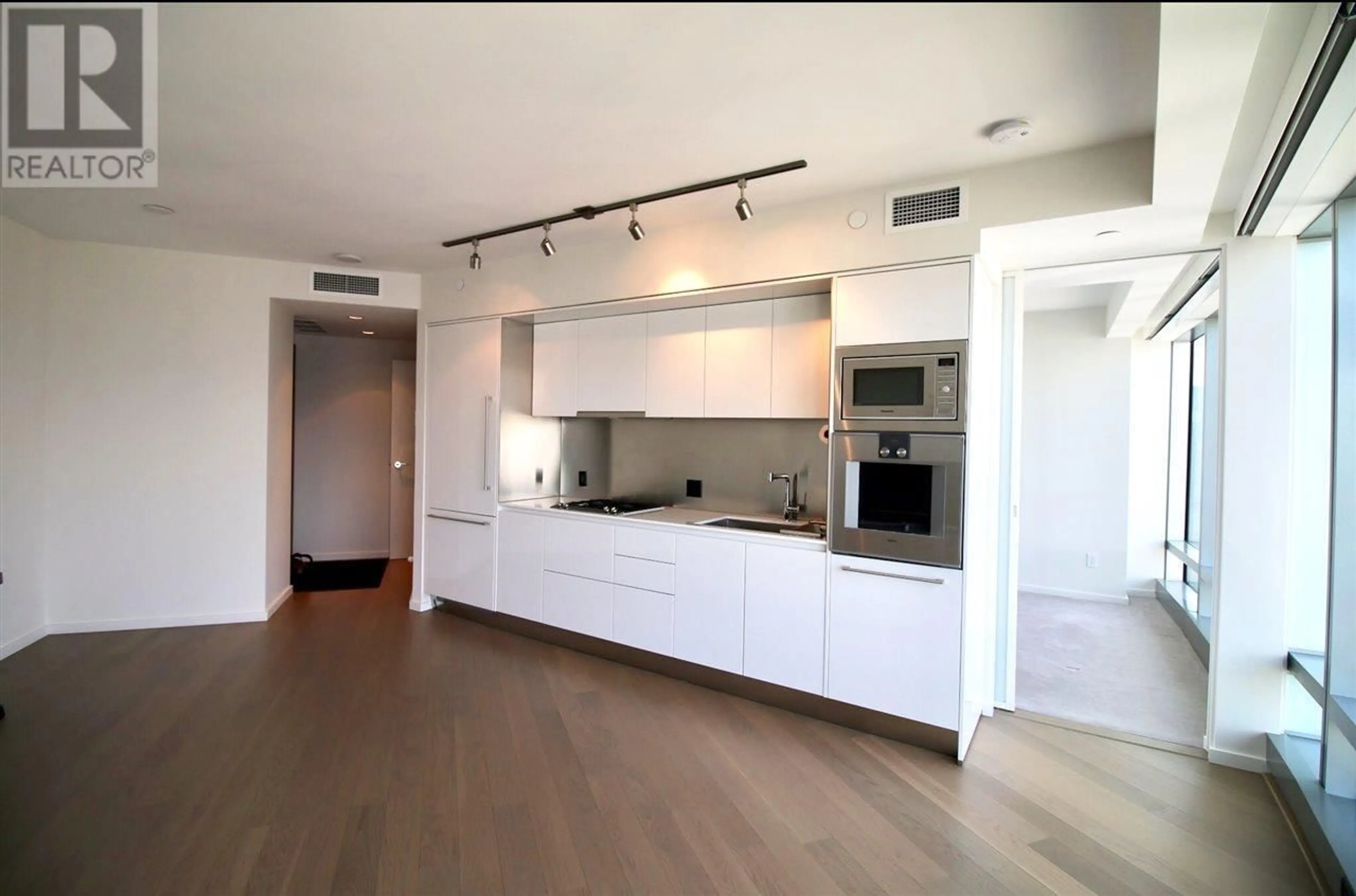 Open concept kitchen, wood/laminate floor for 3306 1151 W GEORGIA STREET, Vancouver British Columbia V6E0B3