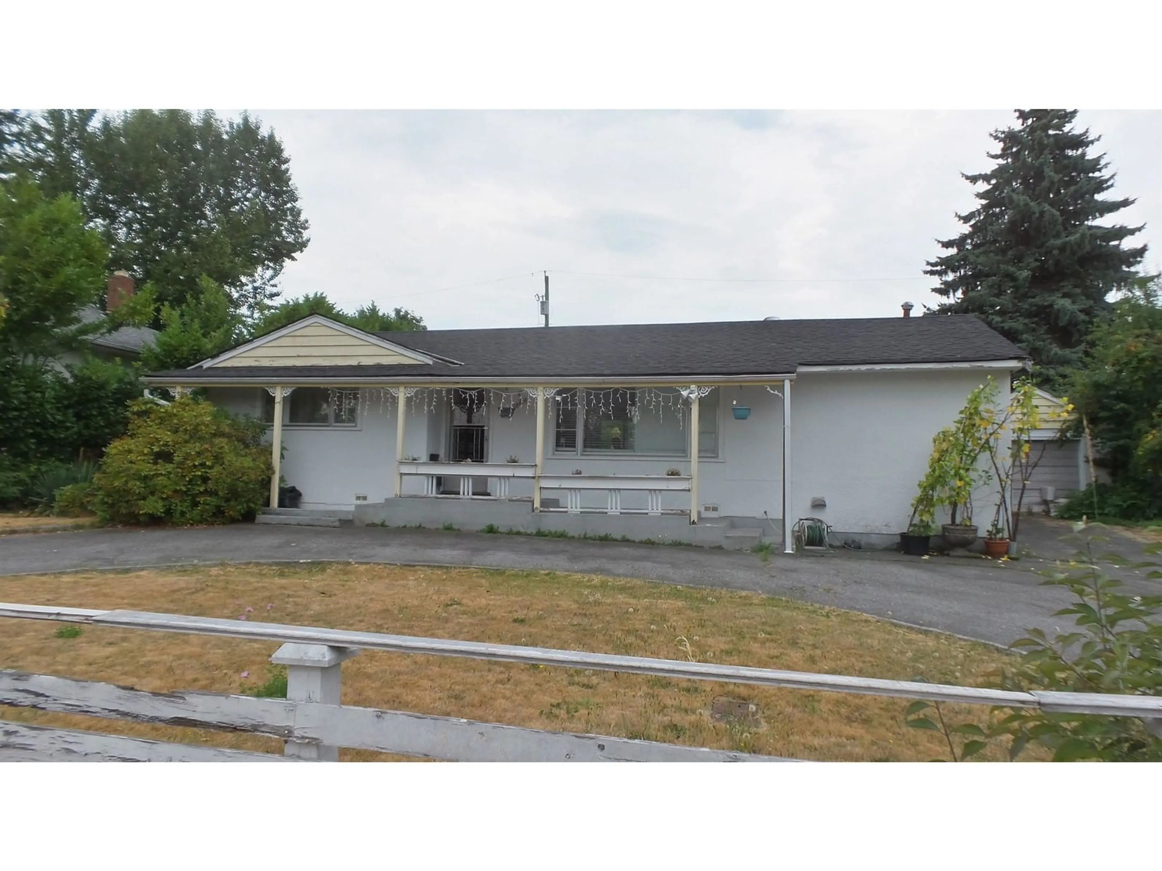 Home with vinyl exterior material, street for 10618 137A STREET, Surrey British Columbia V3T4J6