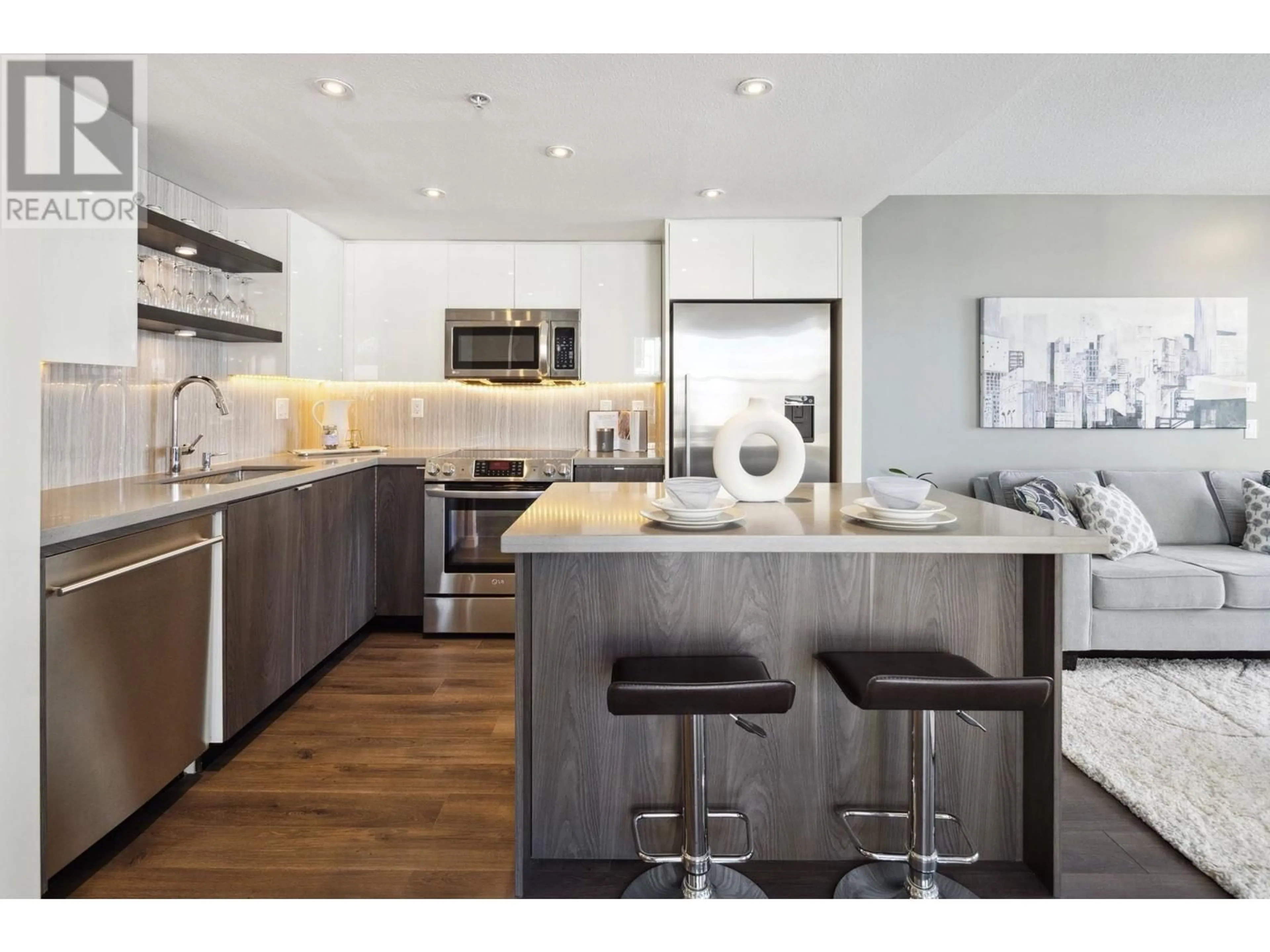 Open concept kitchen, wood/laminate floor for 501 1255 MAIN STREET, Vancouver British Columbia V6A4G5